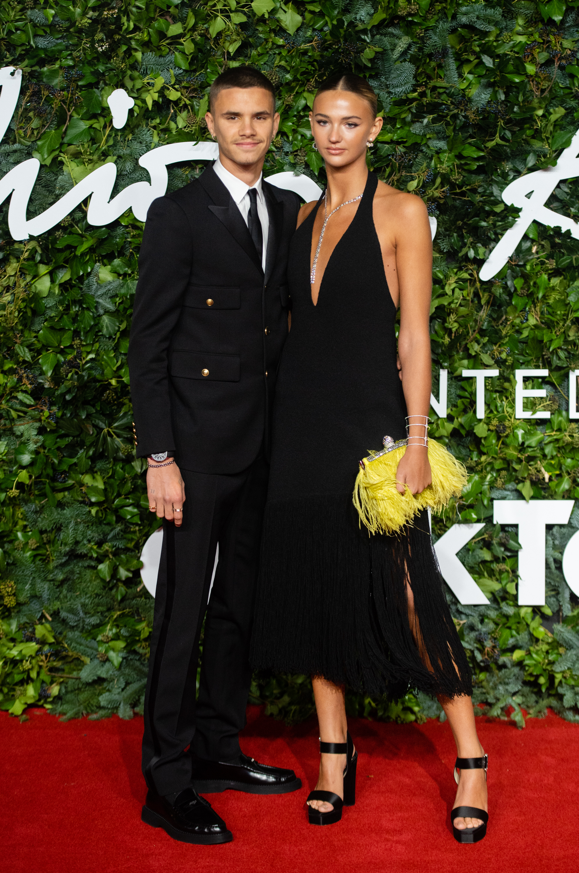 Romeo Beckham and Mia Regan at The British Fashion Awards in London, England, on November 29, 2021. | Source: Getty Images