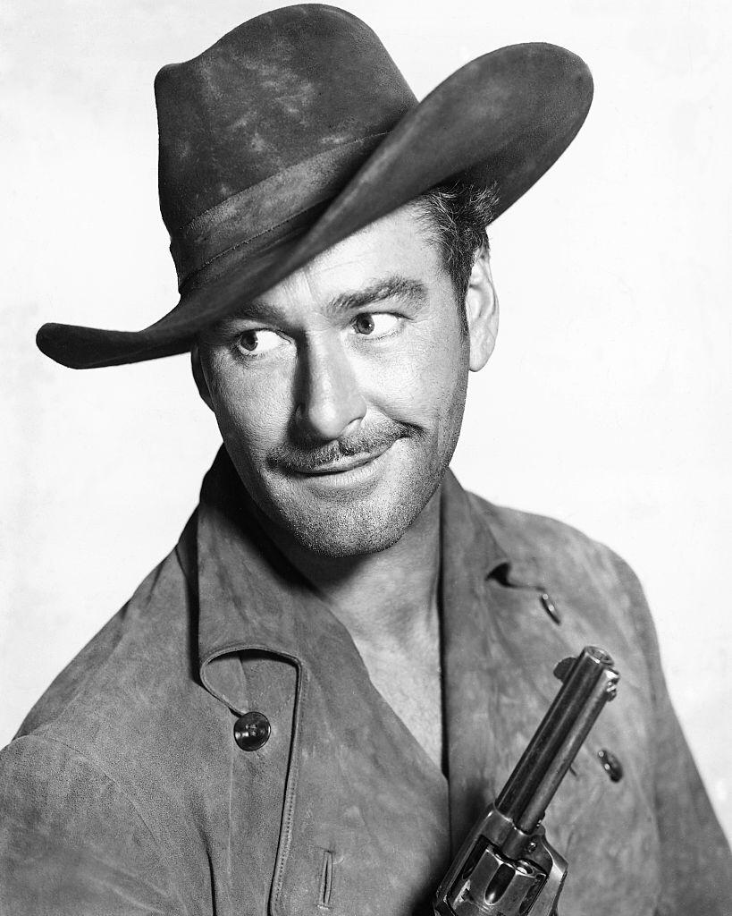 Tasmanian-born actor Errol Flynn in a publicity still for the western 'Rocky Mountain', 1950. | Photo: Getty Images