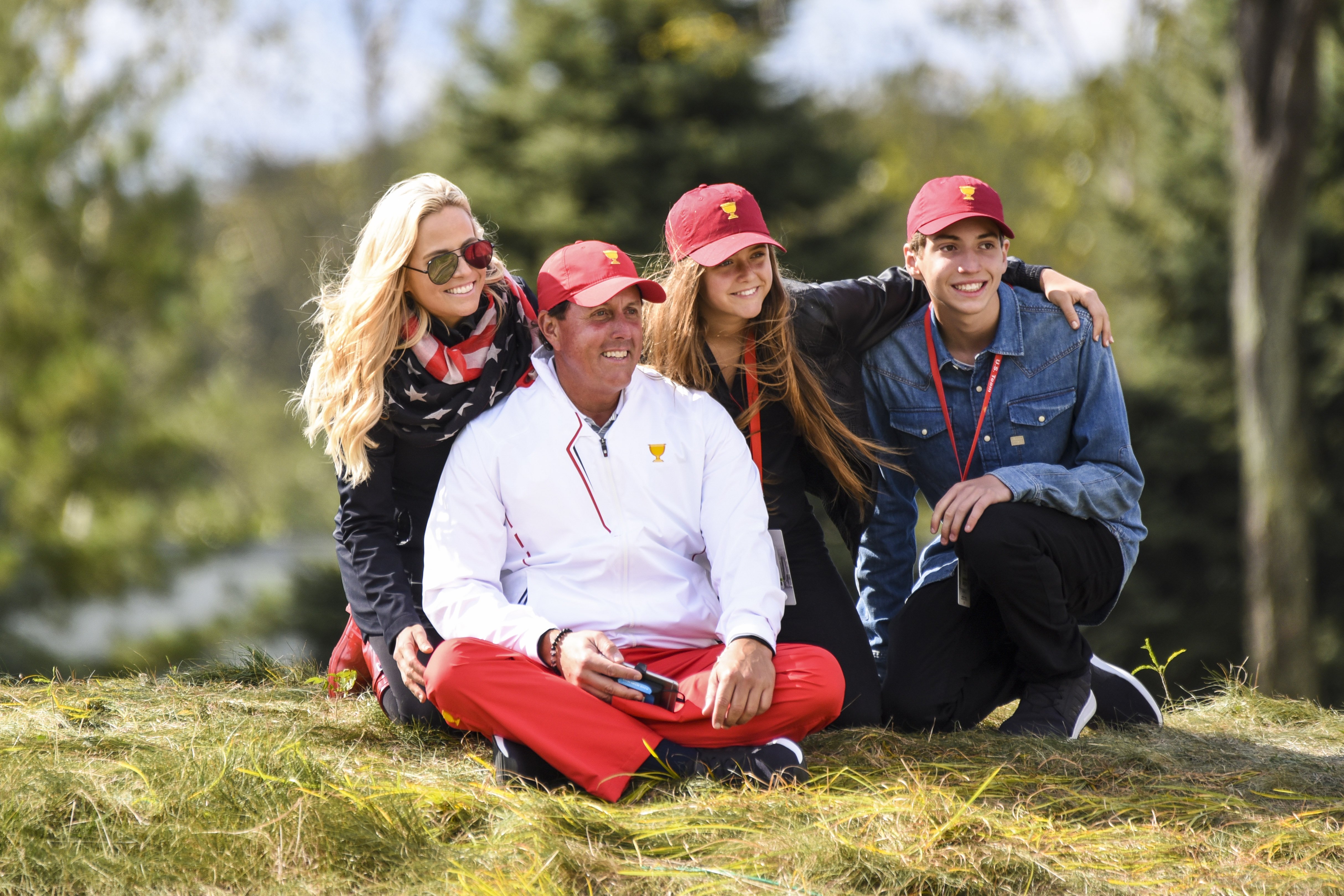 Phil and Amy Mickelson with their children during the third round of the Presidents Cup on September 30, 2017, in Jersey City, New Jersey. | Source: Getty Images