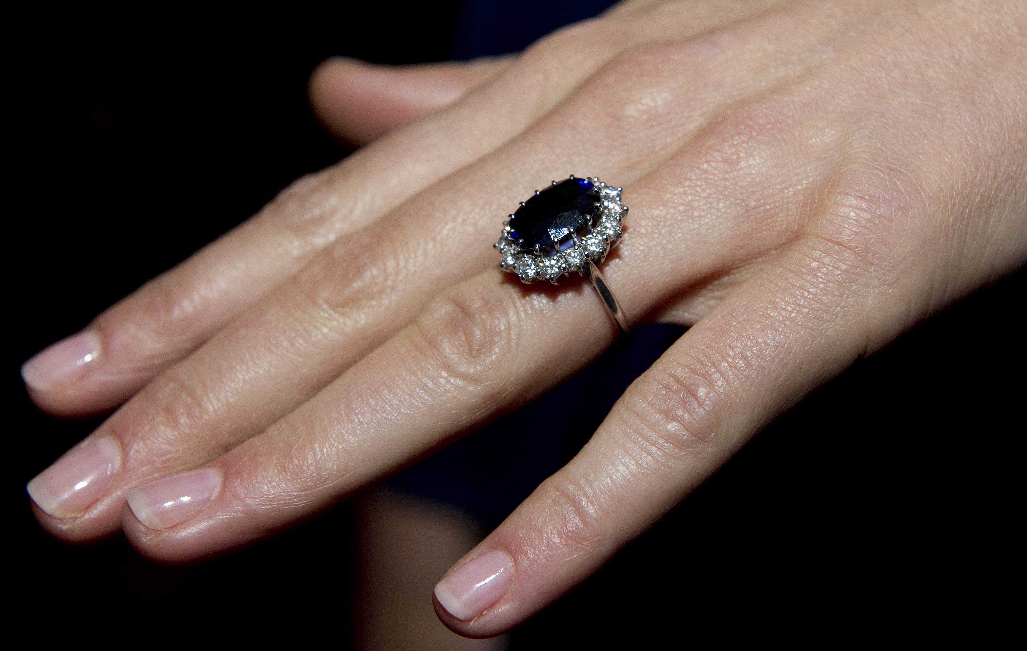 A close up of Kate Middleton's engagement ring as she poses for photographs in the State Apartments with her fiance Prince William of St James Palace on November 16, 2010 in London, England | Source: Getty Images 