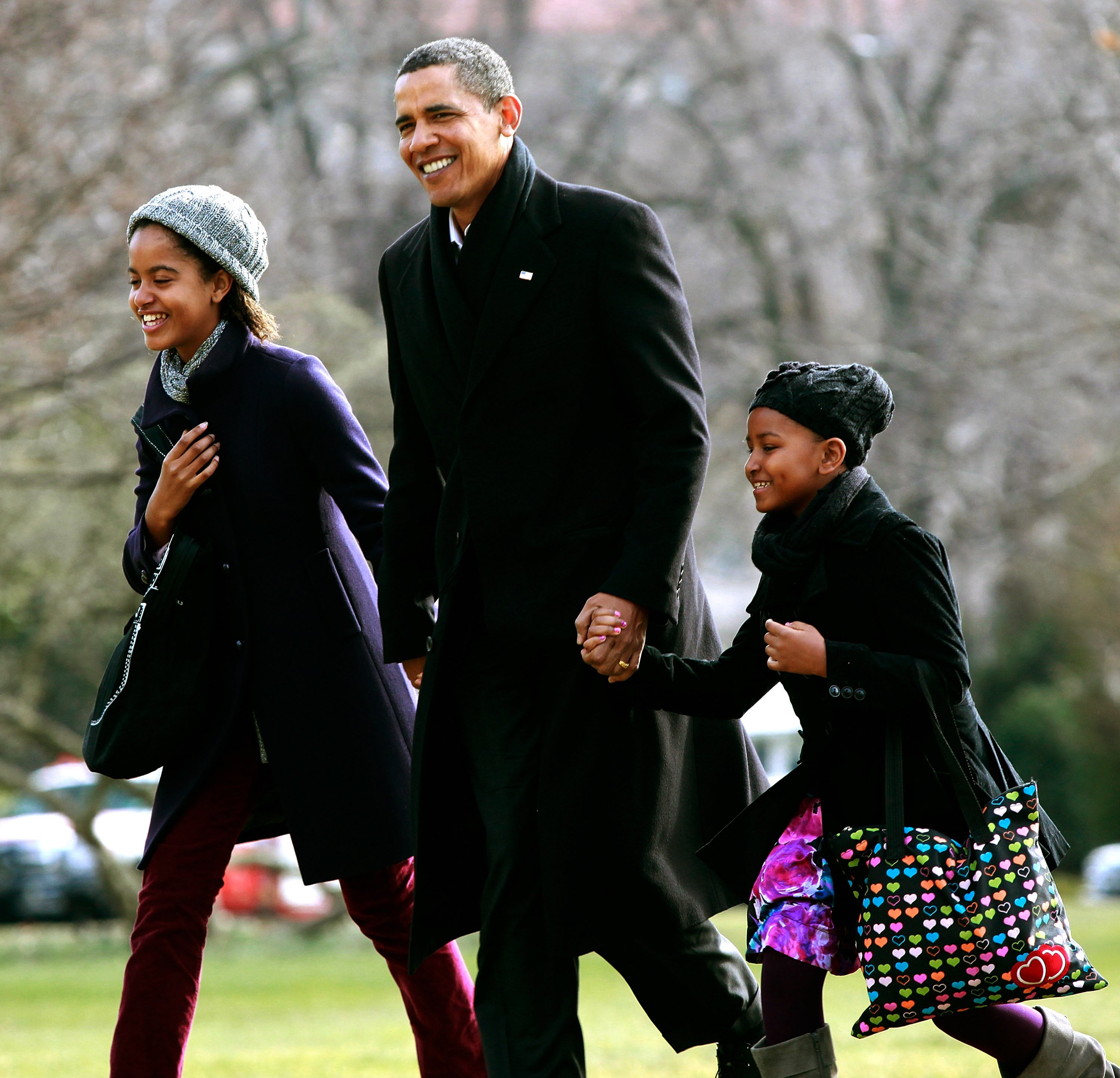 Then-President Barack Obama with his daughters Malia and Sasha on the Souh Lawn of the White House on January 4 2010 in Washington D,C. | Source: Getty Images