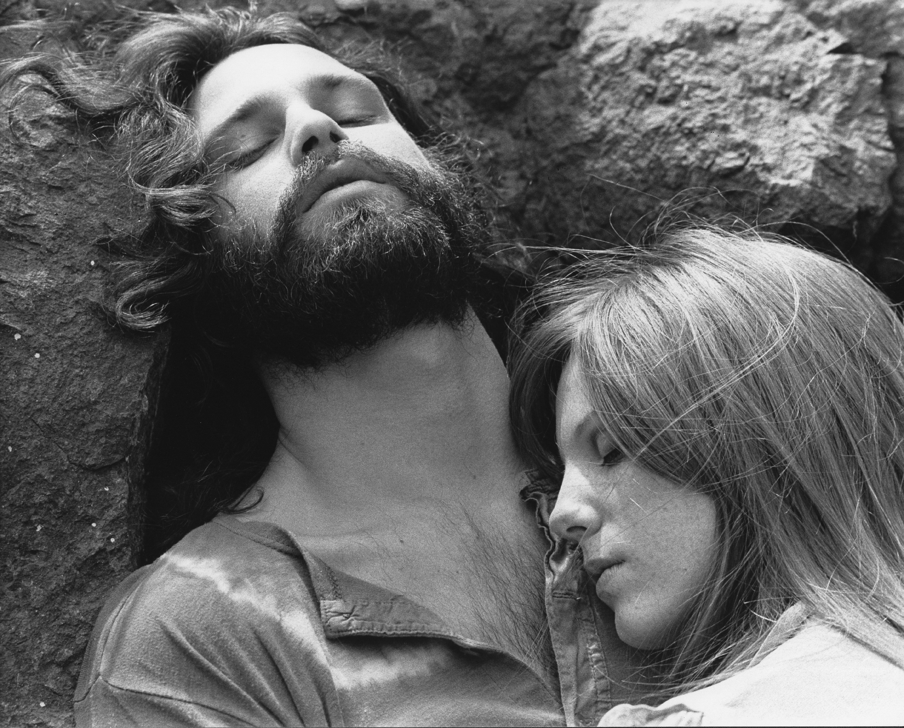 Singer Jim Morrison of The Doors with girlfriend Pamela Courson during a 1969 photo shoot at Bronson Caves in the Hollywood Hills, California. | Source: Getty Imaged