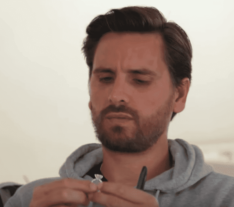 Scott Disick holds the ring given to Khloé by her ex Tristan Thompson. | Source: YouTube/KeepingUpWithTheKardashians