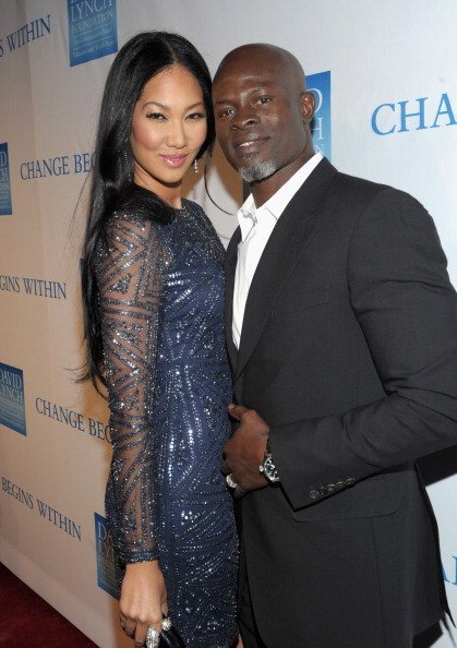 Kimora Lee Simmons and Djimon Hounso at the 3rd Annual "Change Begins Within" Benefit Celebration on December 3, 2011 | Photo: Getty Images