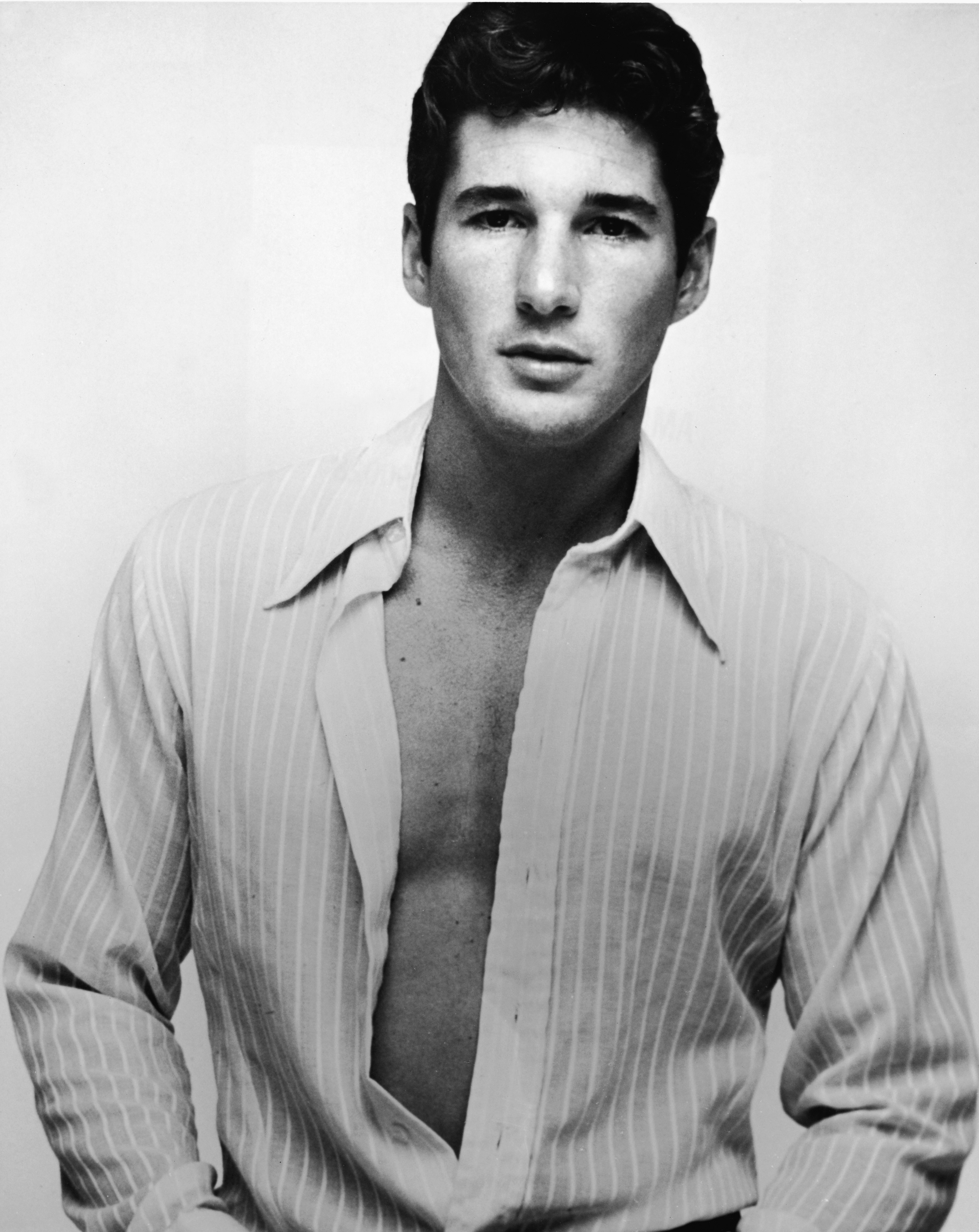 Richard Gere posing in a black and white portrait in the late 1970s | Source: Getty Images