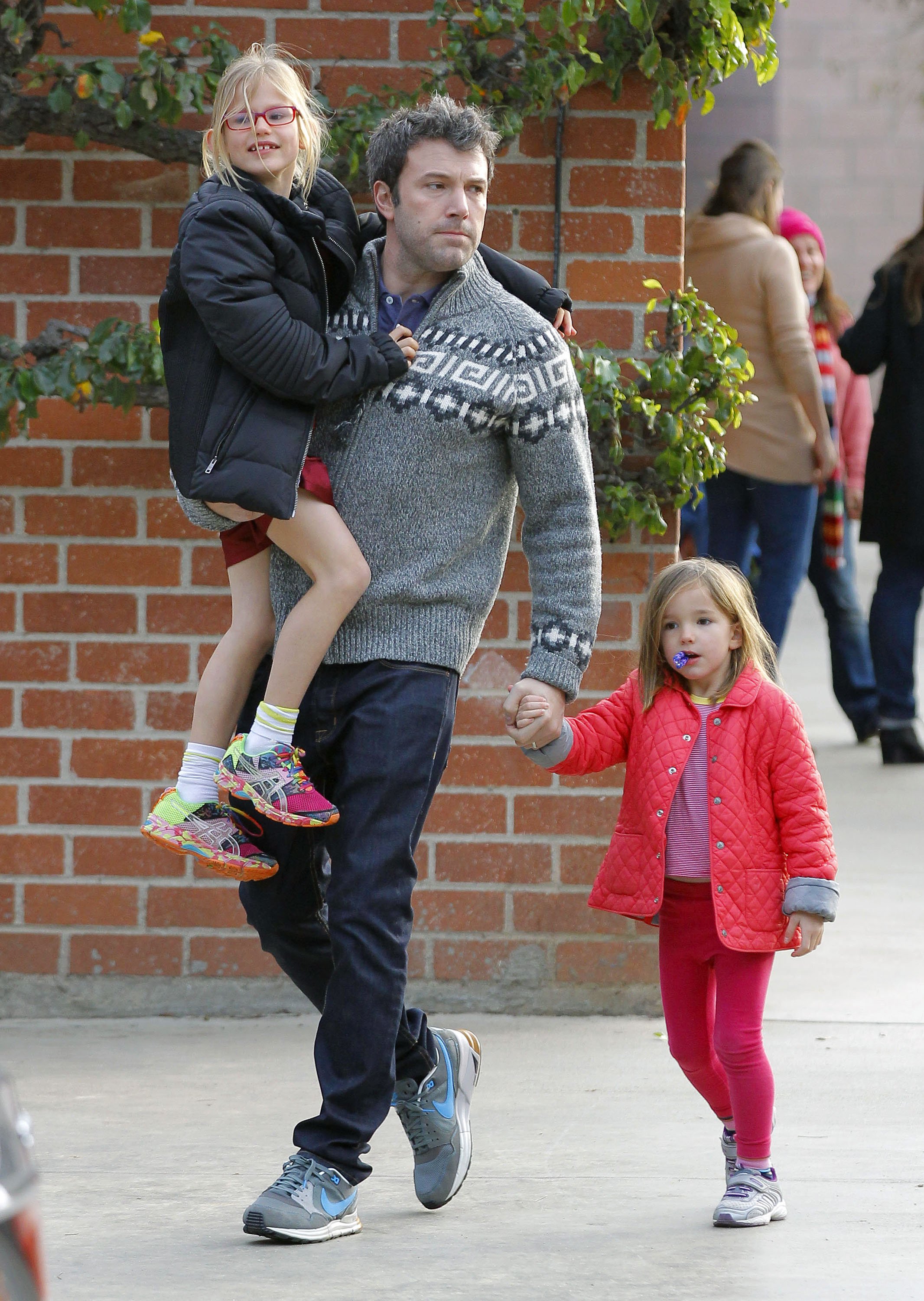 Ben Affleck and his daughters, Violet and Seraphina Affleck, spotted leaving the park on December 08, 2013 in Los Angeles, California. / Source: Getty Images