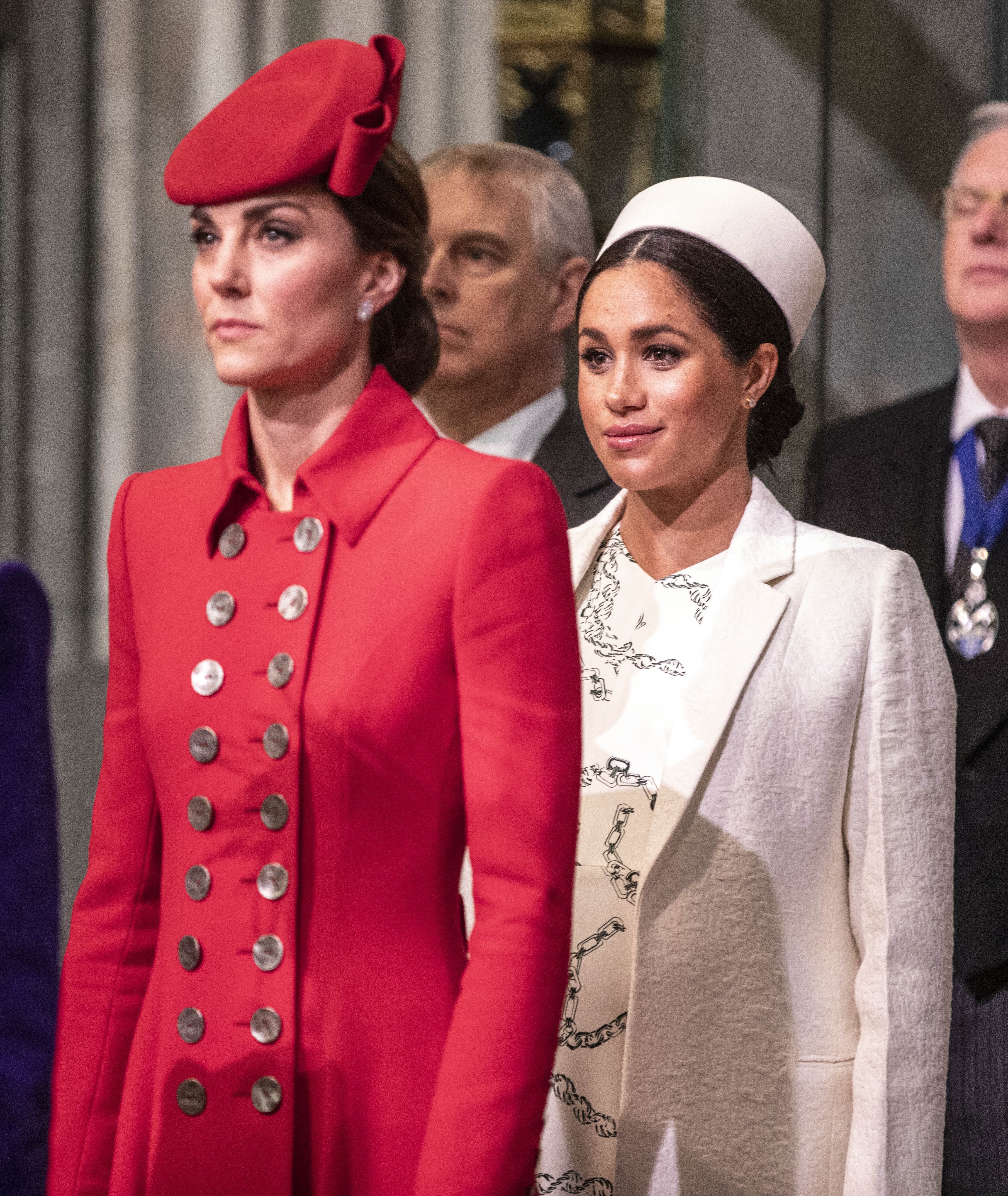 The Duchess of Cambridge stands with Duchess of Sussex at Westminster Abbey for a Commonwealth day service on March 11, 2019 in London, England | Photo: Getty Images