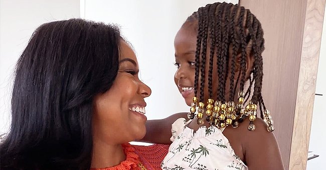 Gabrielle Union S Daughter Praised For Showing Her Braids With Gold Beads In A Printed Ensemble