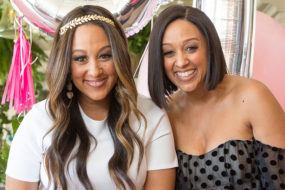 Tamera Mowry-Housley and Tia Mowry attend Tamera's baby shower at Casa Del Mar on April 4, 2015. | Photo: Getty Images