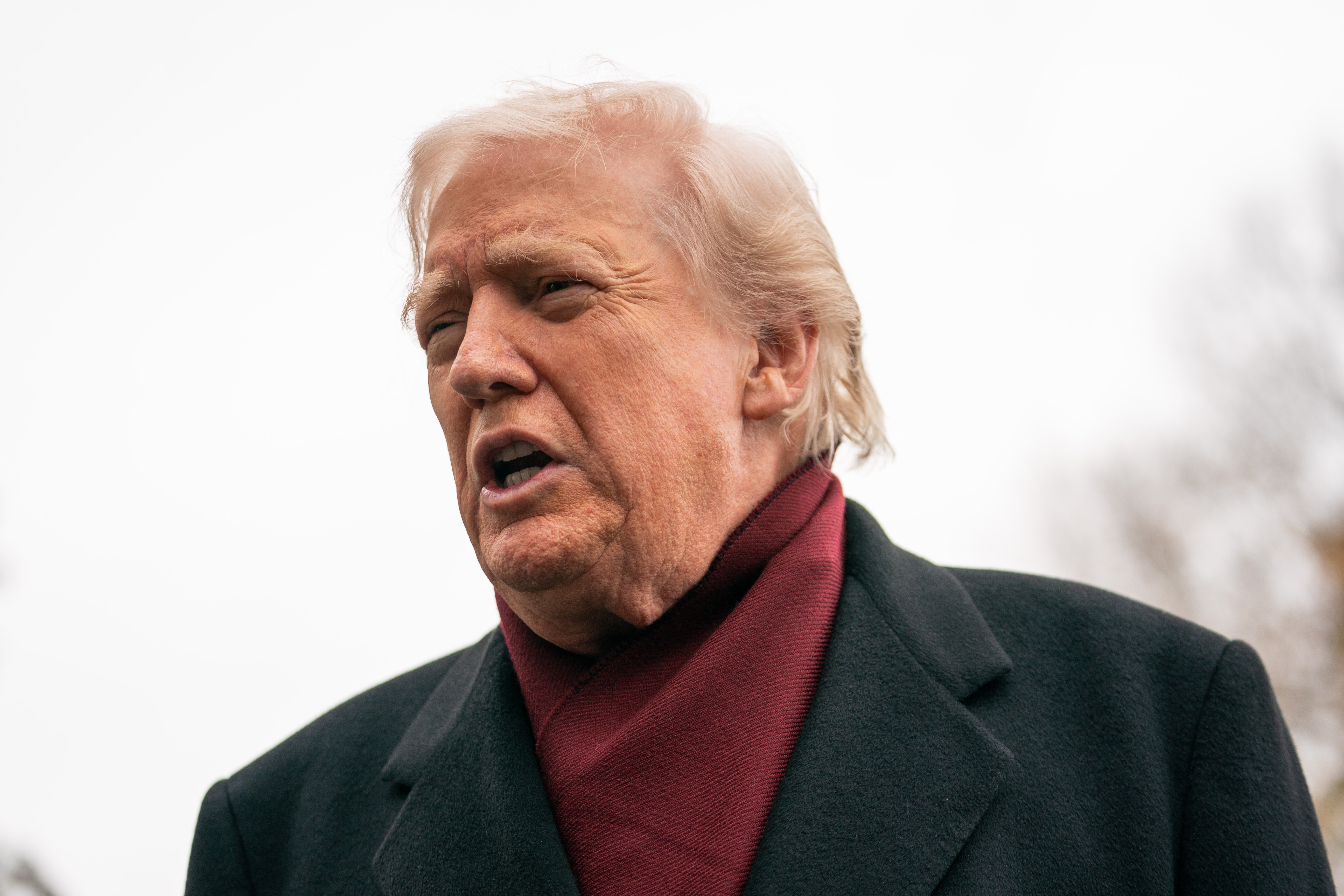 U.S. President Donald Trump speaking to press as he departs the White House in Washington, D.C., on November 22, 2025. | Source: Getty Images