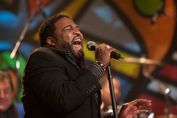 Gerald Levert performs with band The Funk Brothers | Photo: Getty Images