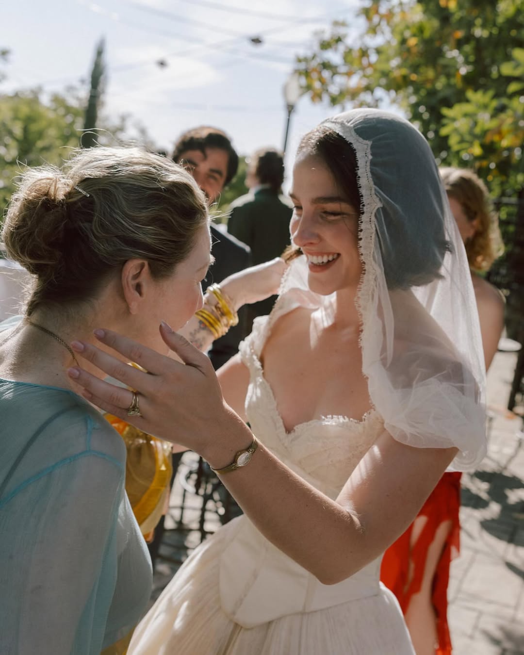 Tatum O'Neal about to hug her new daughter-in-law Fern Cozine at her wedding to Kevin McEnroe, from a post dated July 20, 2025 | Source: Instagram/tatum__oneal