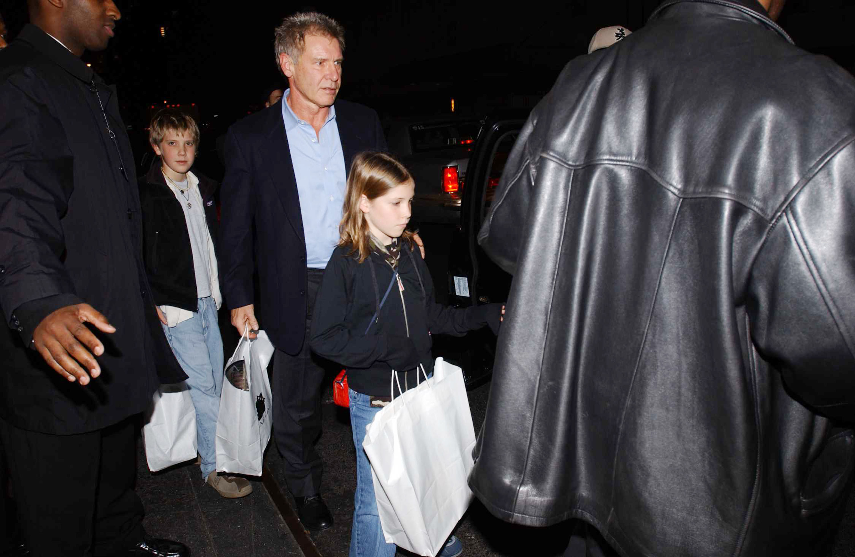 Harrison Ford and his children Georgia and Malcolm on December 14, 2001 in New York City. | Source: Getty Images