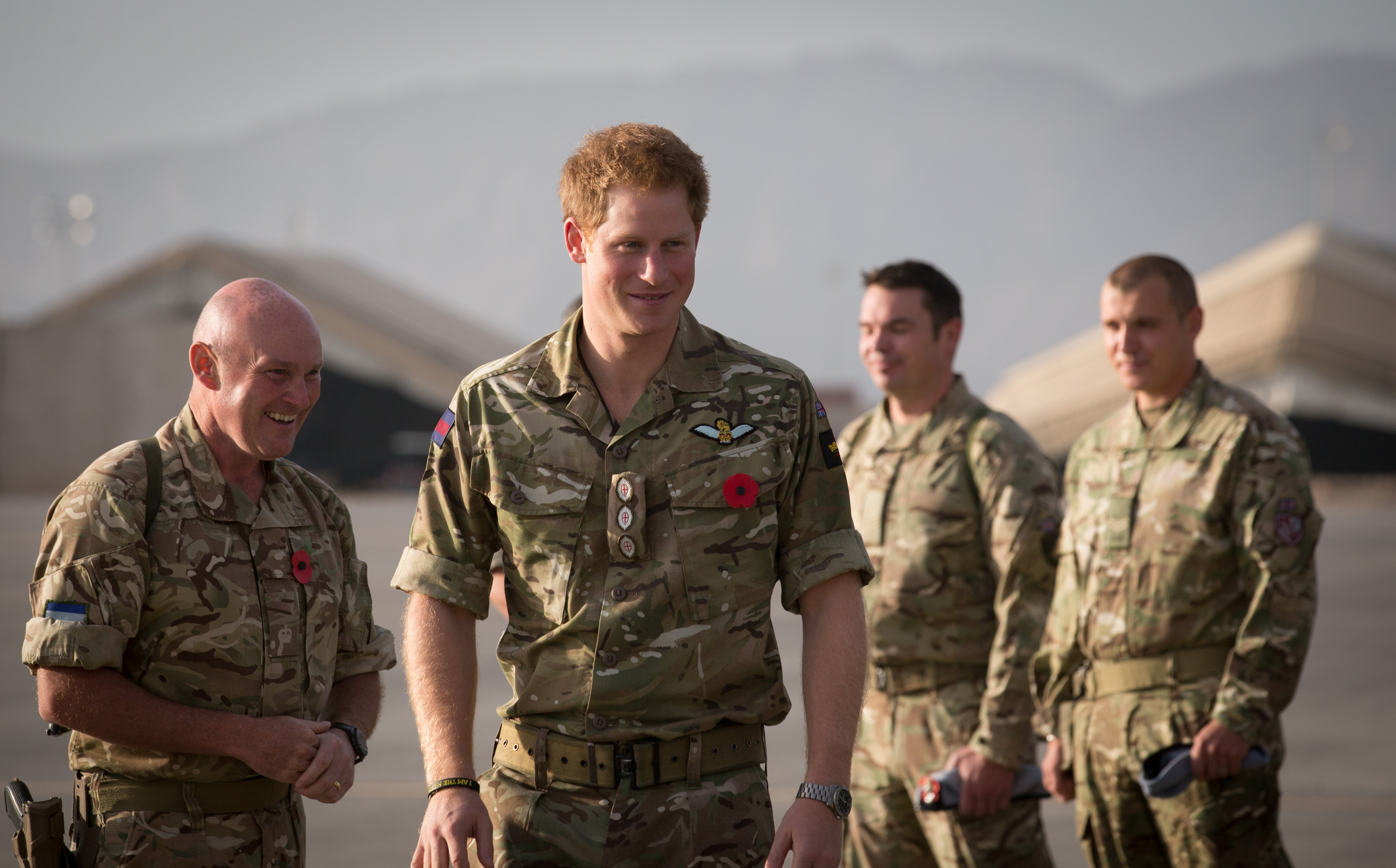 Prince Harry meeting up with British service personel following a Remembrance Sunday service at Kandahar Airfield on November 9, 2014, in Kandahar, Afghanistan | Source: Getty Images