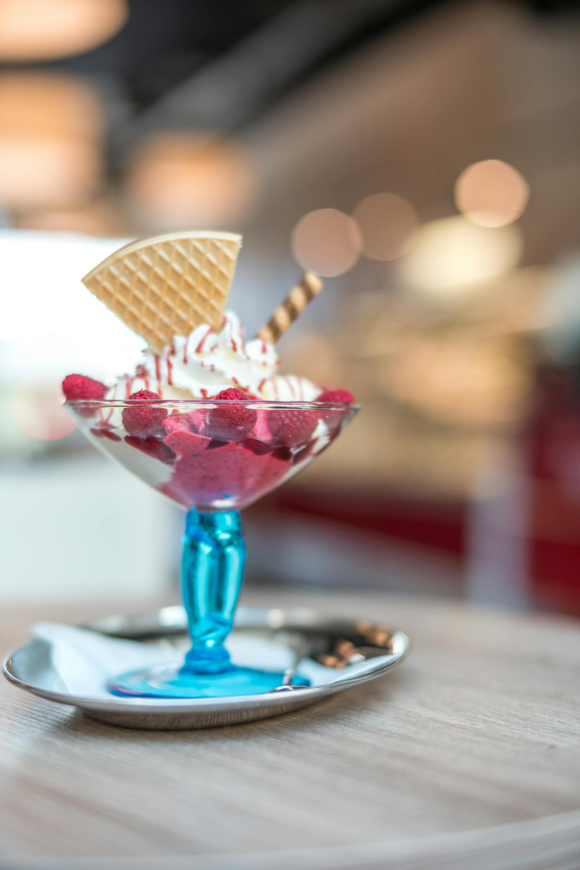 A selective focus photography of a strawberry ice cream with cookie | Source: Pexels