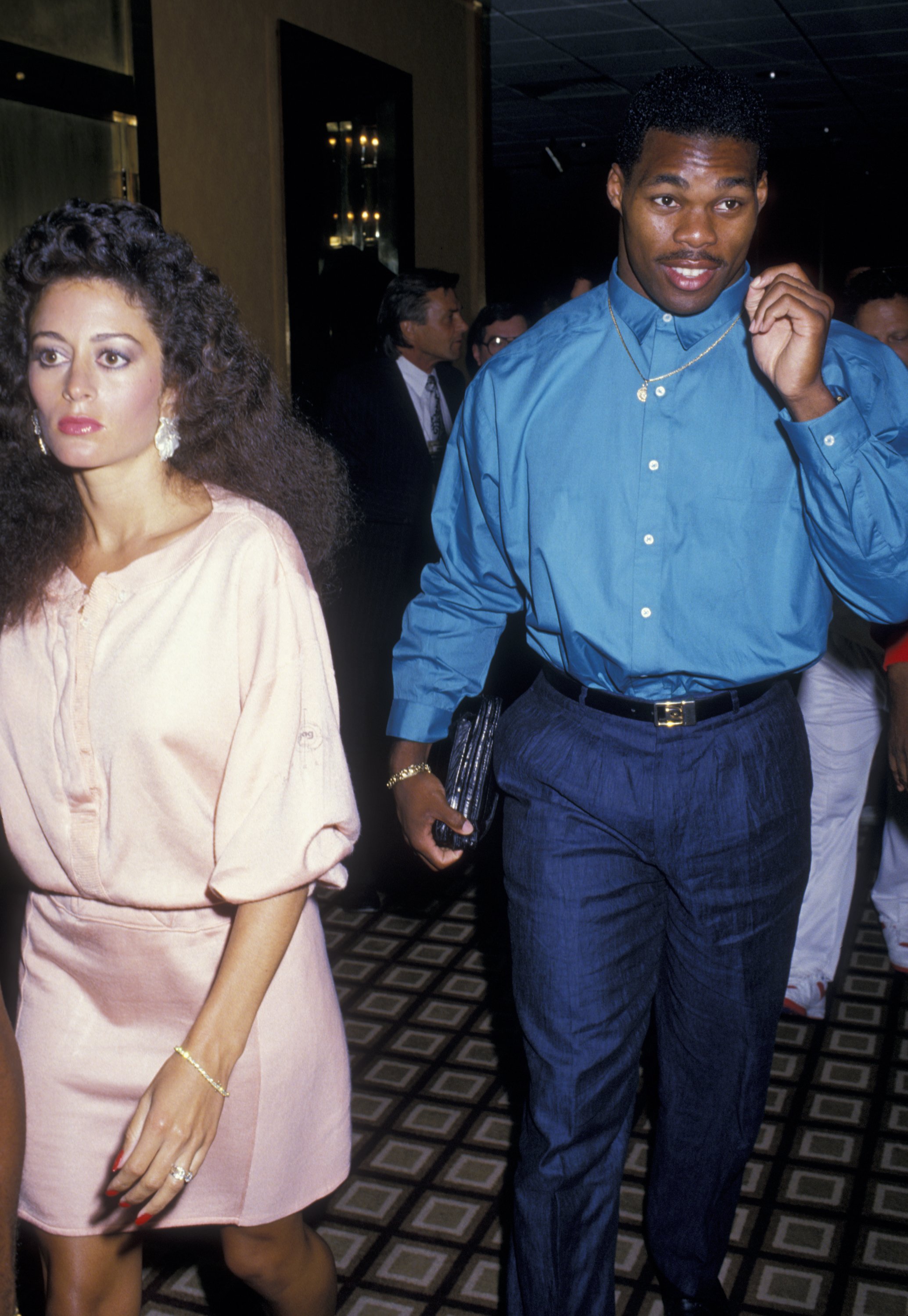 Herschel Walker, along with Cindy Deangelis Grossman, at the Tyson vs. Spinks Boxing Match on June 27, 1988, in Atlantic City, New Jersey. | Source: Getty Images