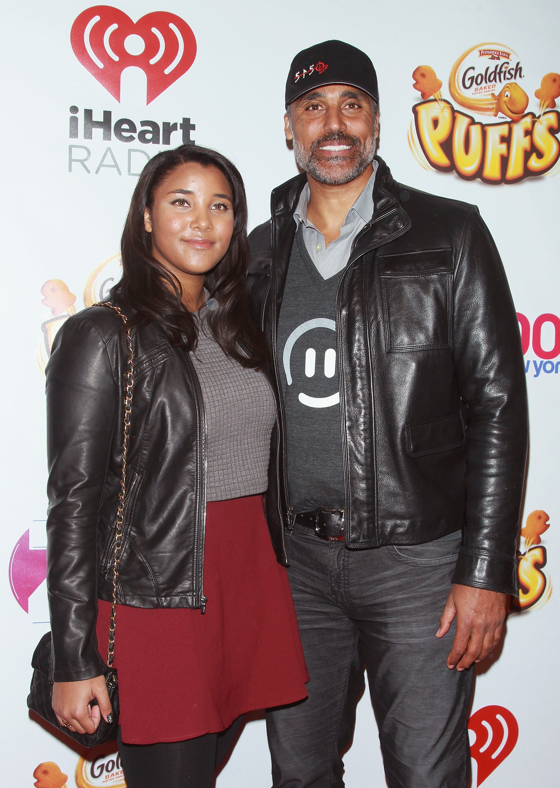 Rick Fox and his daughter Sasha Gabriella Fox attending z100s Jingle Ball at Madison Square Garden on December 12, 2014 in New York City.┃Source: Getty Images