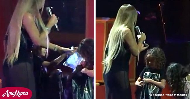Mariah Carey interrupts concert to correct her son on stage