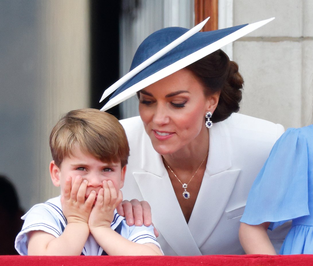 Prince Louis of Cambridge and Catherine, Duchess of Cambridge watch a flypast from the balcony of Buckingham Palace during Trooping the Colour on June 2, 2022 in London, England. | Source: Getty Images