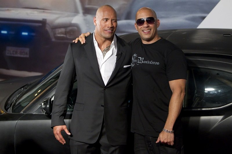 Dwayne Johnson et Vin Diesel le 15 avril 2011 à Rio de Janeiro, au Brésil | Photo : Getty Images
