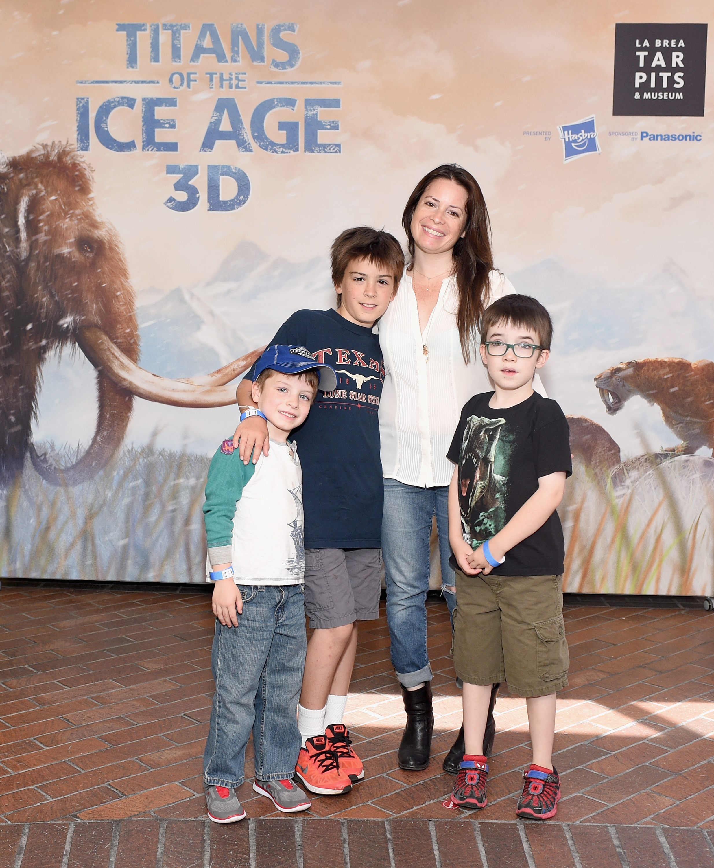 Holly Marie Combs and her sons, Kelley, Finley, and Riley Donoho, at the "Titans of the Ice Age" premiere in Los Angeles, California, on June 20, 2015 | Source: Getty Images