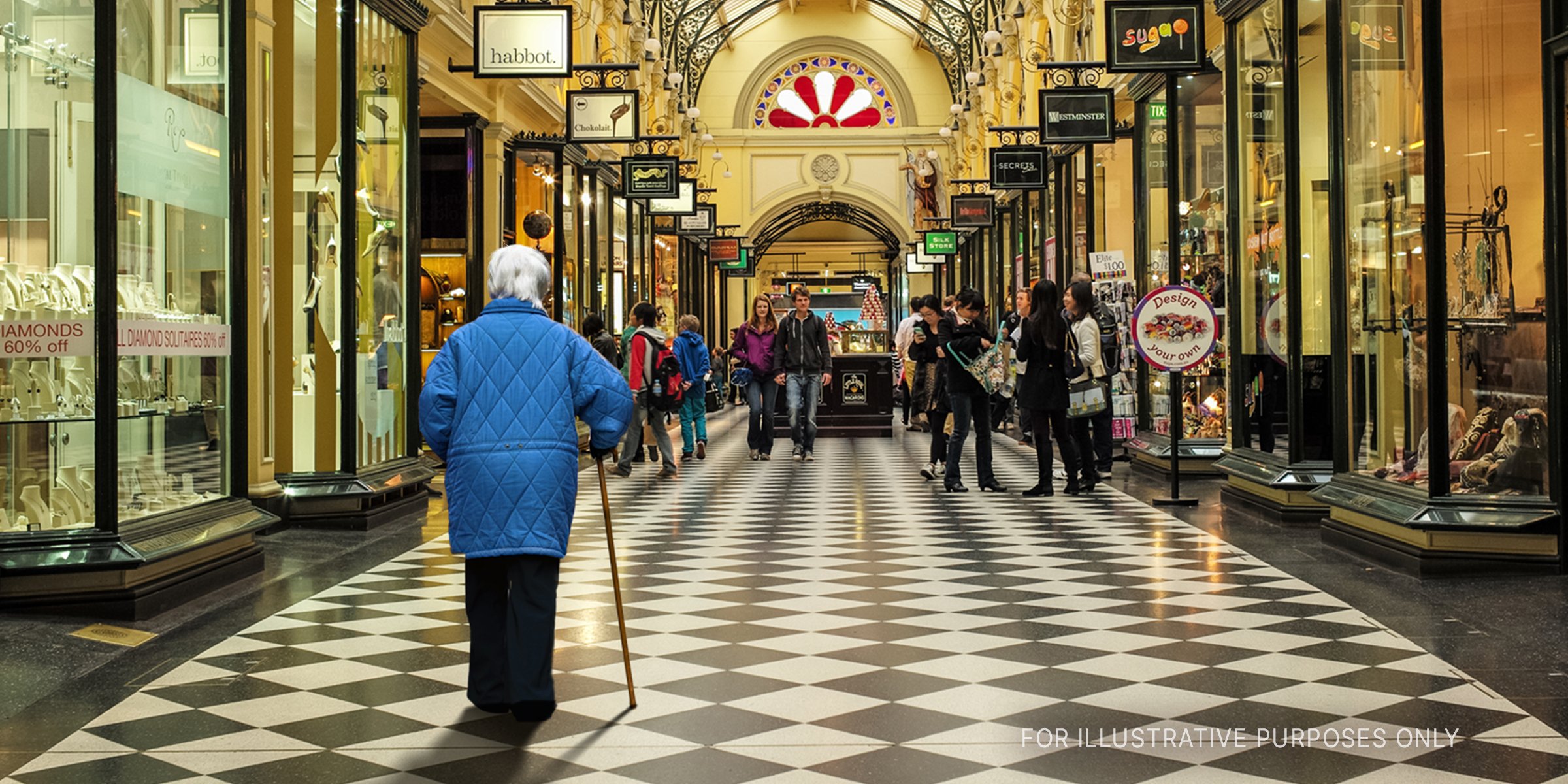 Elderly woman with a cane walks in a department store | Source: Getty Images