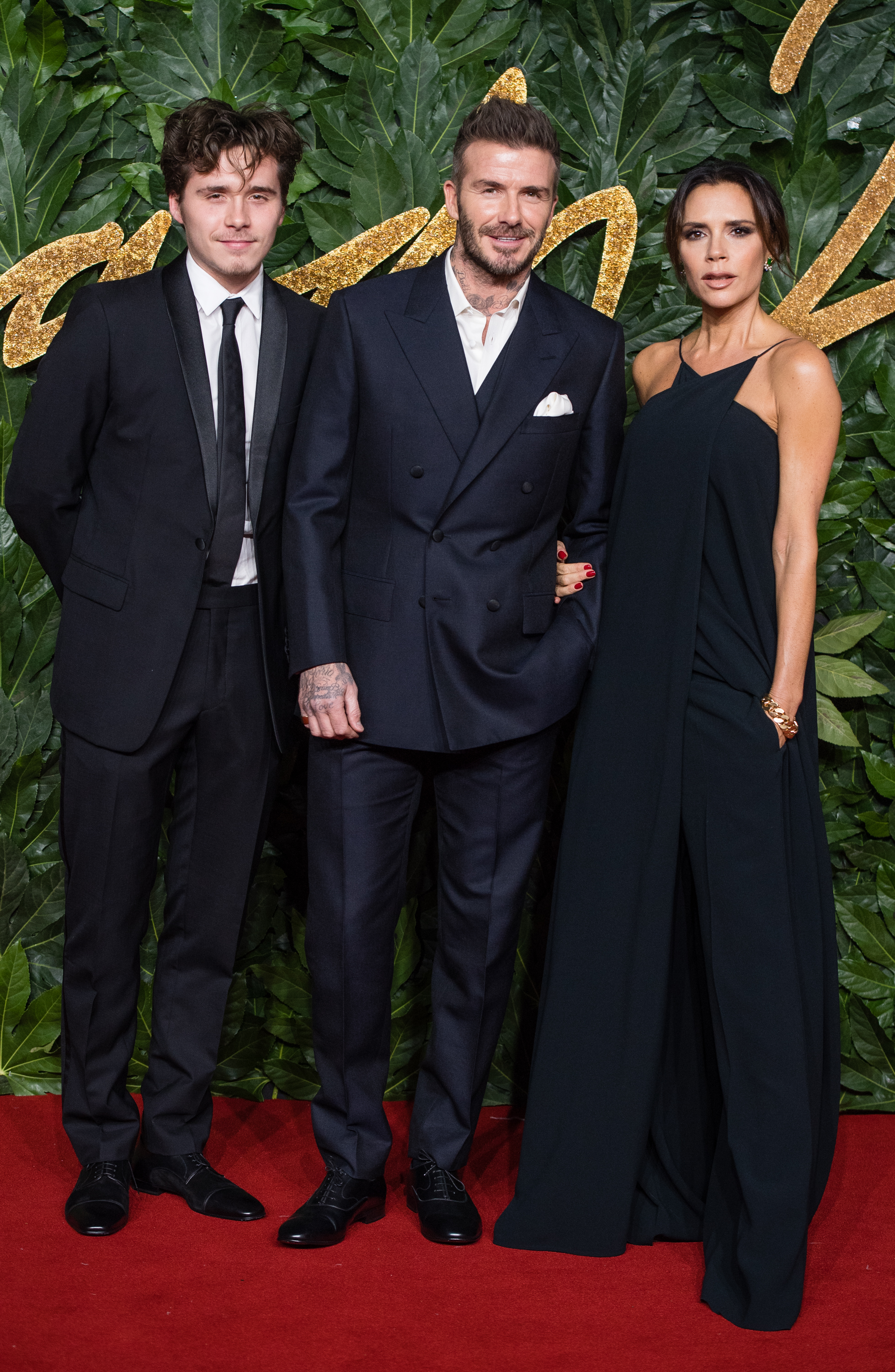 Brooklyn, David, and Victoria Beckham arrive at The Fashion Awards 2018 In Partnership With Swarovski at Royal Albert Hall on 10 December 2018 in London, England. | Source: Getty Images