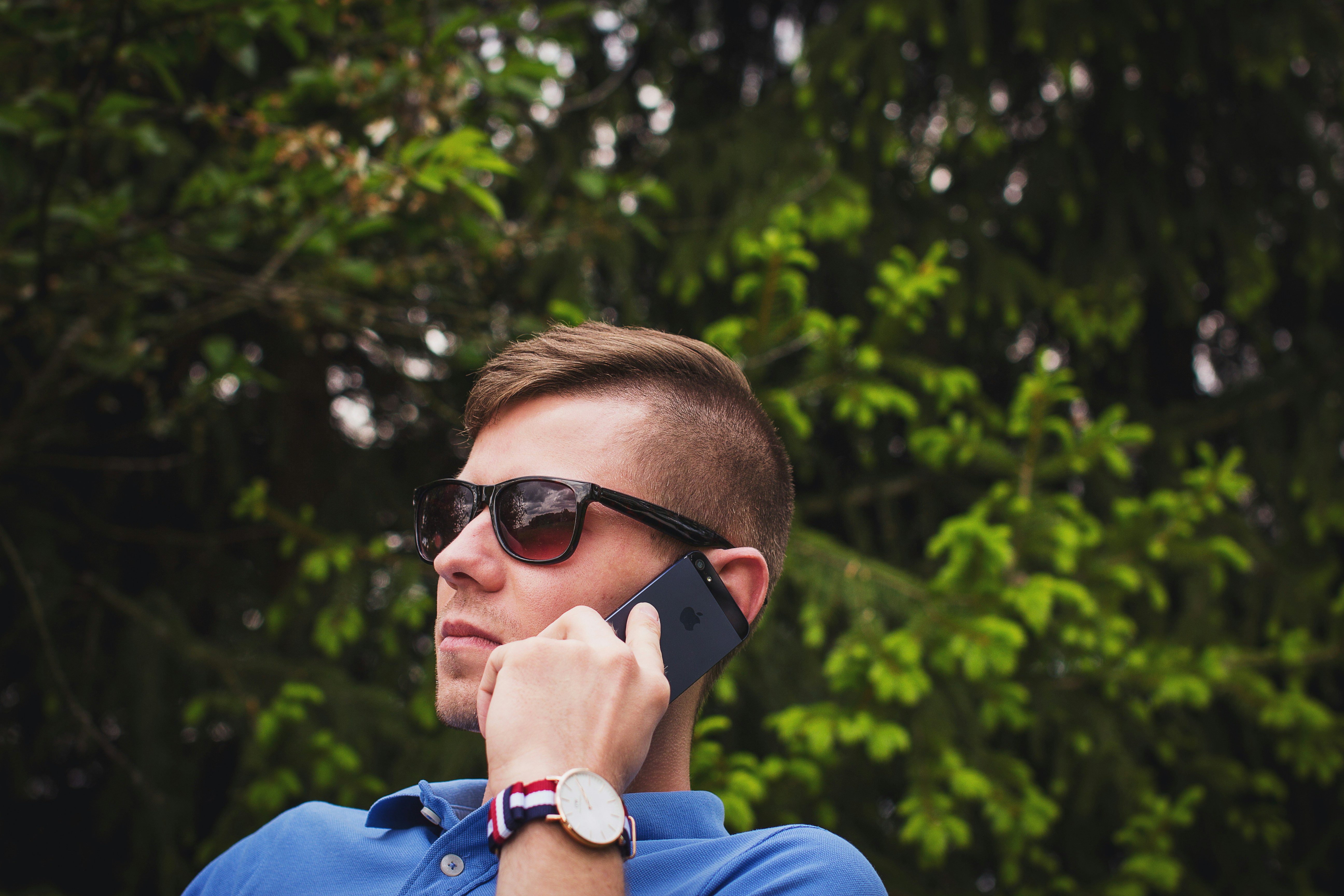 A handsome man on a phone call | Source: Unsplash