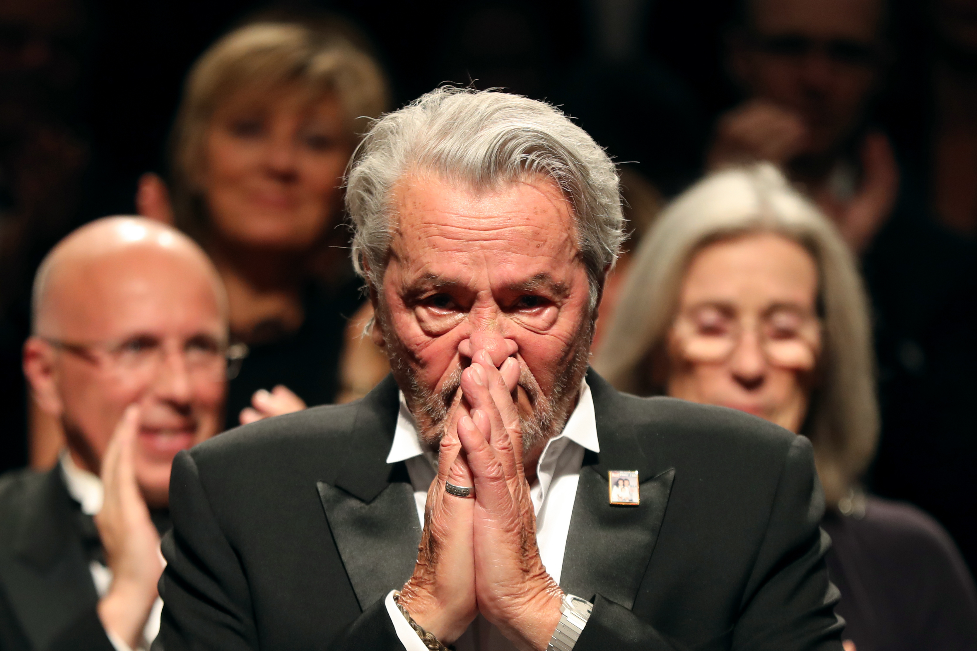 Alain Delon accepting the Palme d'Or d'Honneur award during the Ceremony for Palme Honneur during the 72nd Annual Cannes Film Festival on May 19, 2019. | Source: Getty Images