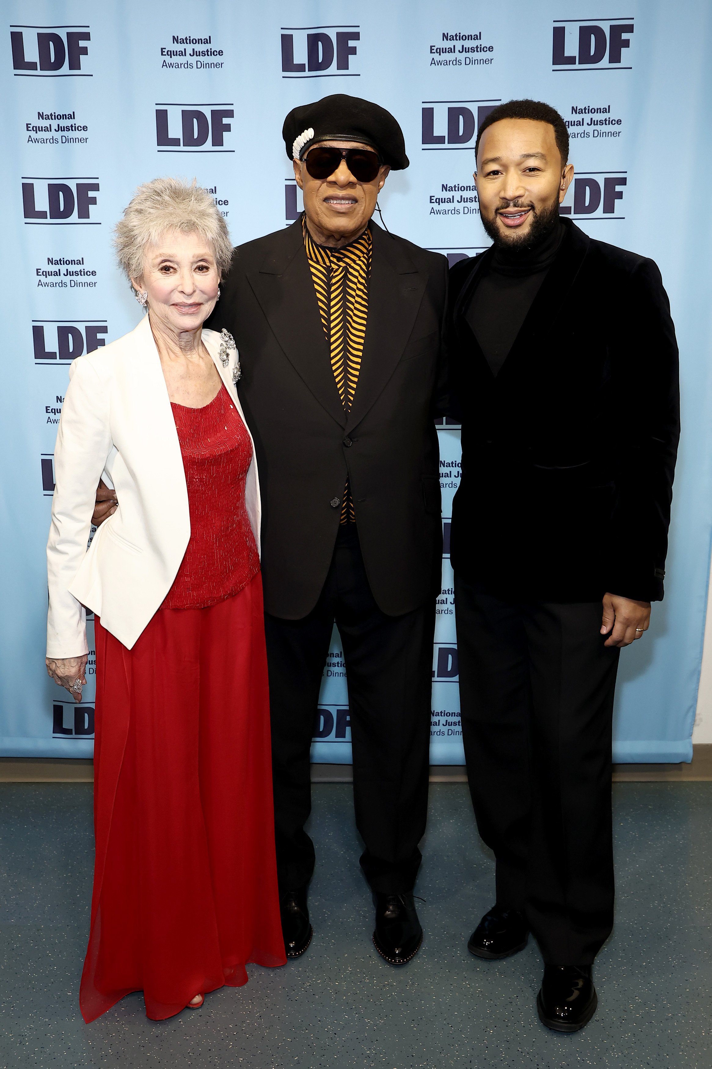Rita Moreno, Stevie Wonder, and John Legend at the LDF 34th National Equal Justice Awards Dinner on May 10, 2022 | Source: Getty Images