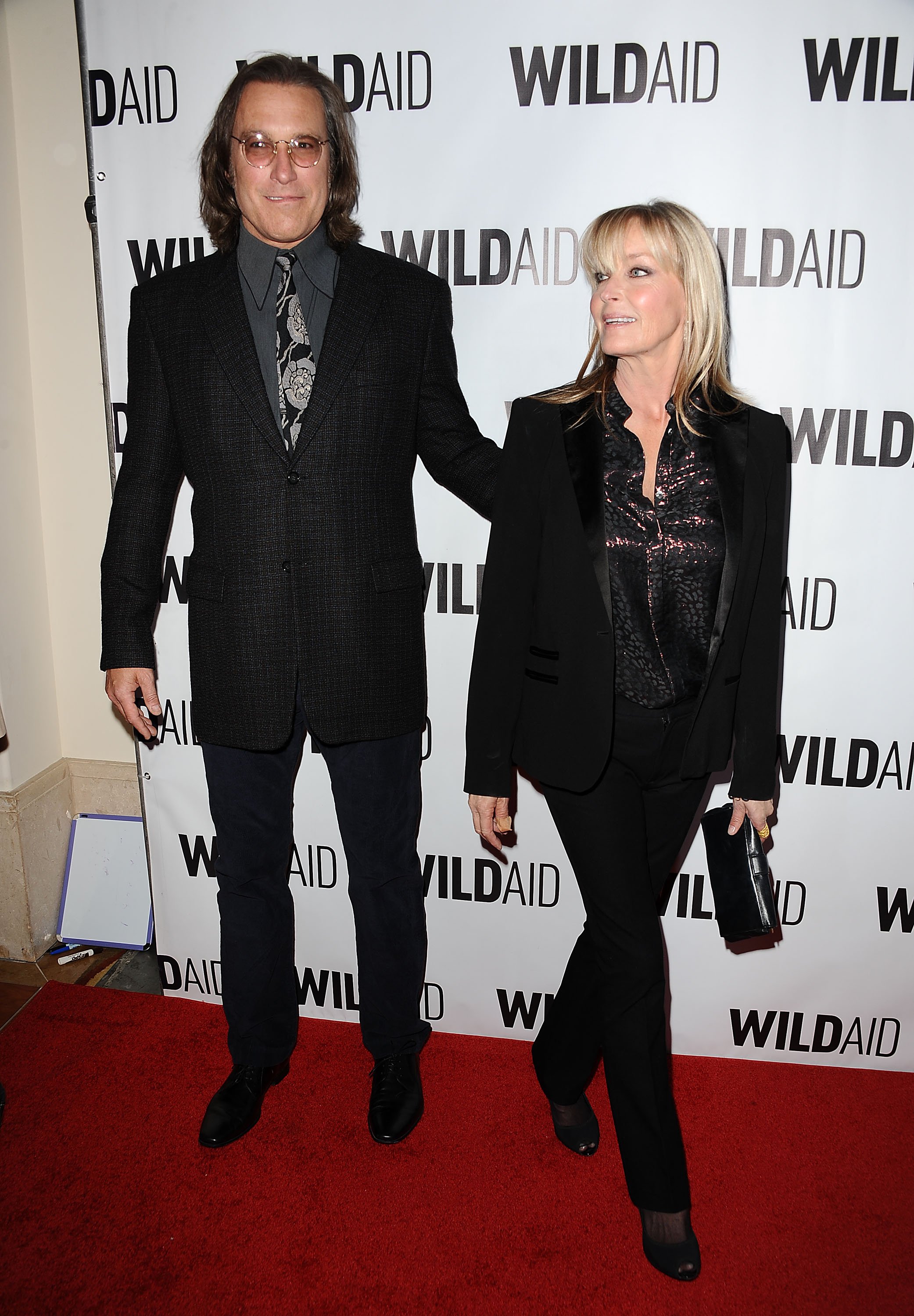 Actor John Corbett and actress Bo Derek attend WildAid 2015 at Montage Hotel on November 7, 2015 in Beverly Hills, California | Source: Getty Images 