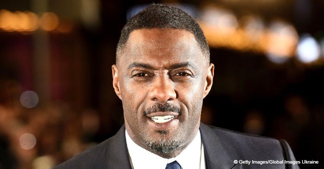 Idris Elba can't keep his hands off his gorgeous fiancée who stuns in skintight silver dress