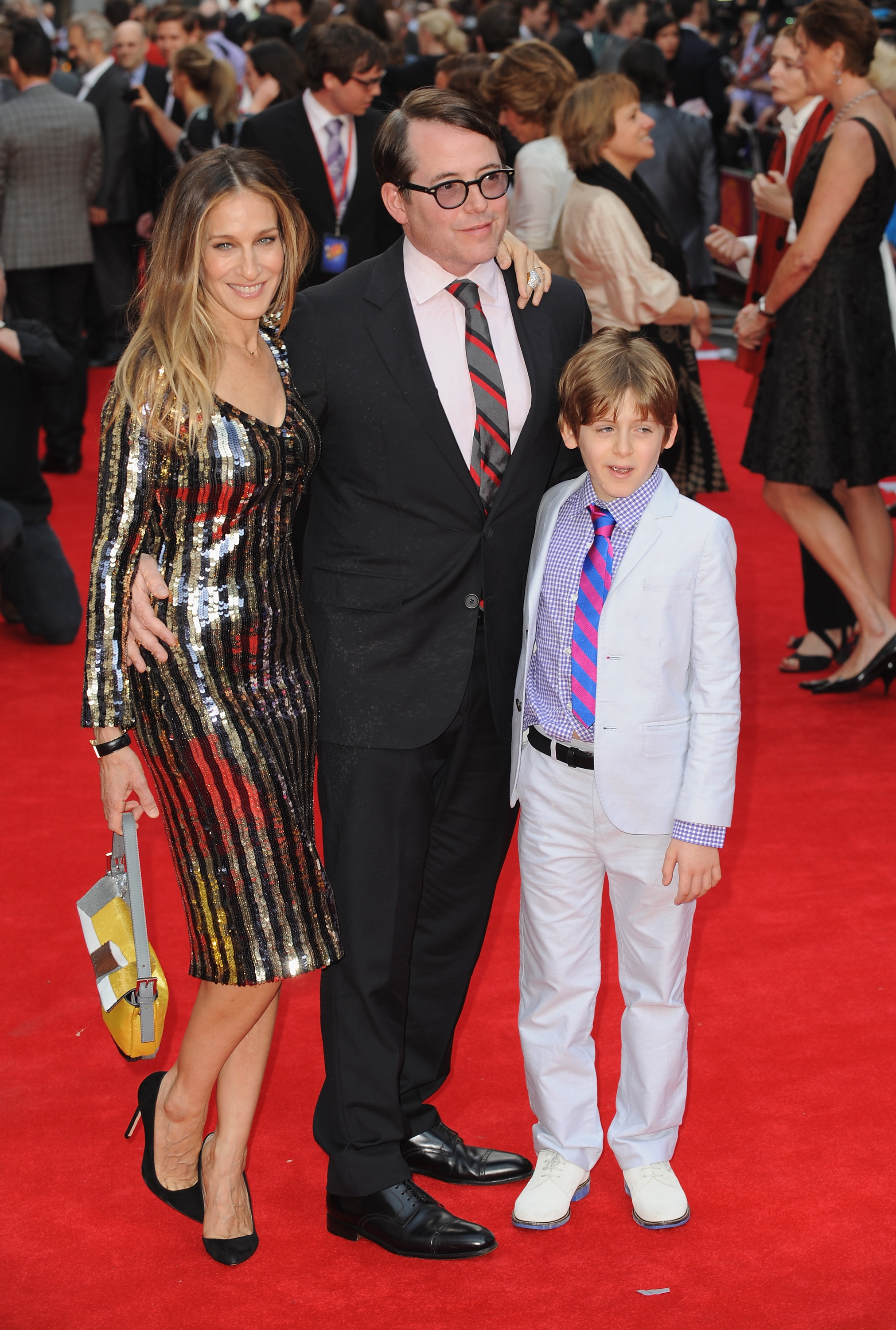 Sarah Jessica Parker, Matthew Broderick, and James Broderick at the press night for "Charlie and the Chocolate Factory" at Theatre Royal on June 25, 2013, in London, England | Source: Getty Images