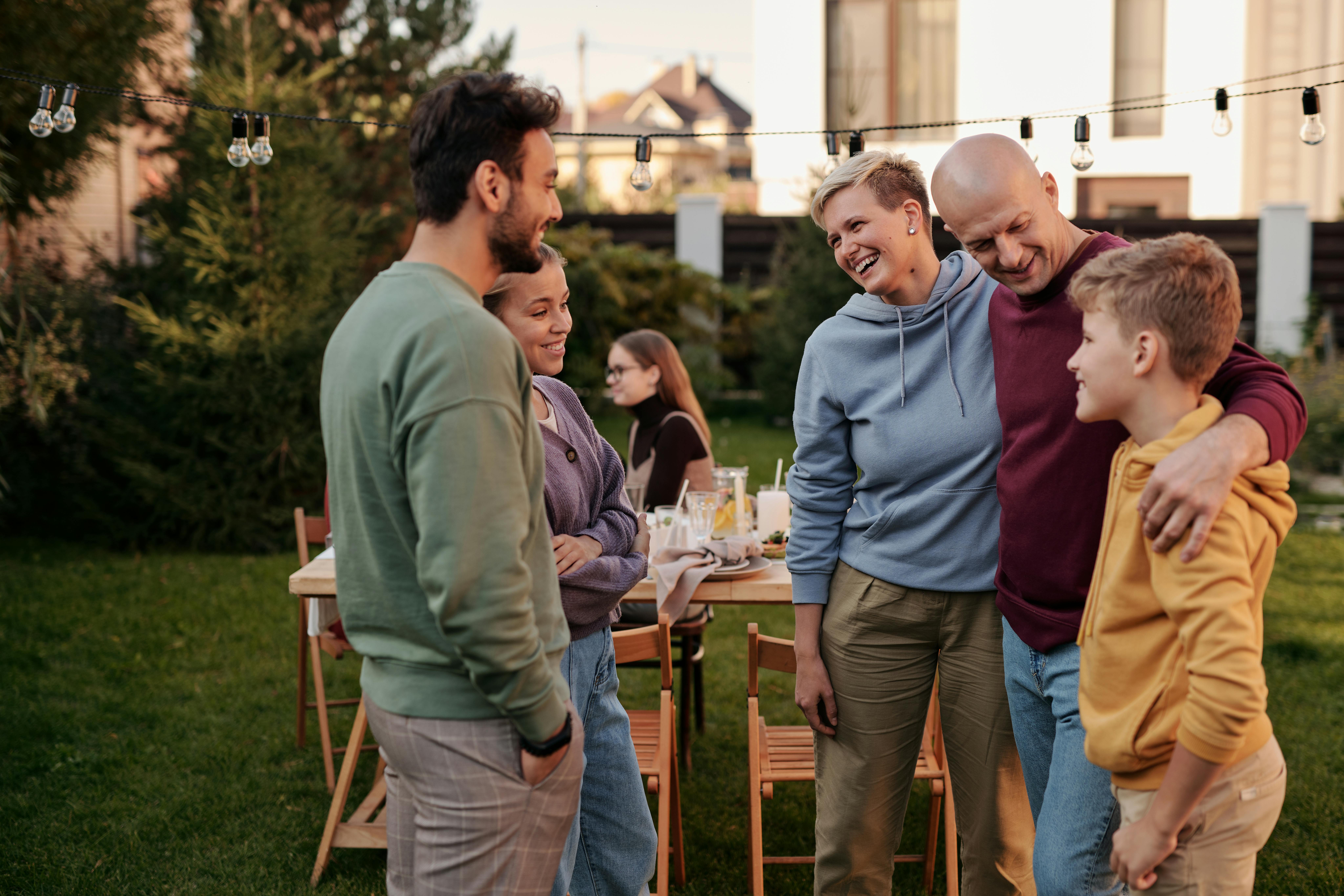 A family conversing during a get-together | Source: Pexels