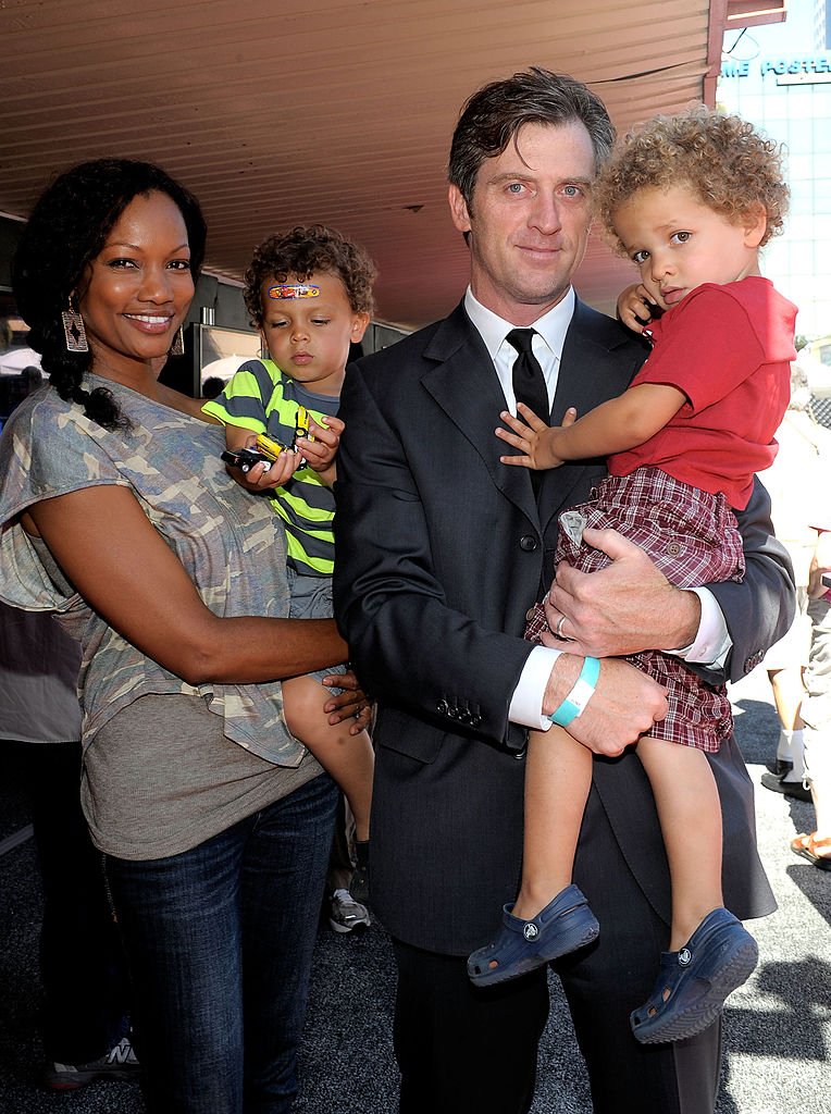 Actress Garcelle Beauvais, husband Mike Nilon, children Jax Nilon and Jaid Nilon attend Disney/Pixar "World Of Cars Online" launch event held at Bob's Big Boy on August 11, 2010 | Photo: Getty Images