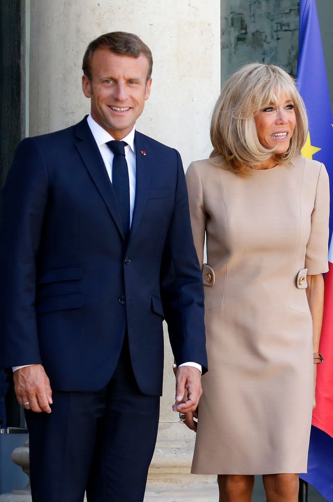 Emmanuel et Brigitte Macron le 22 août 2019 à Paris. l Source : Getty Images
