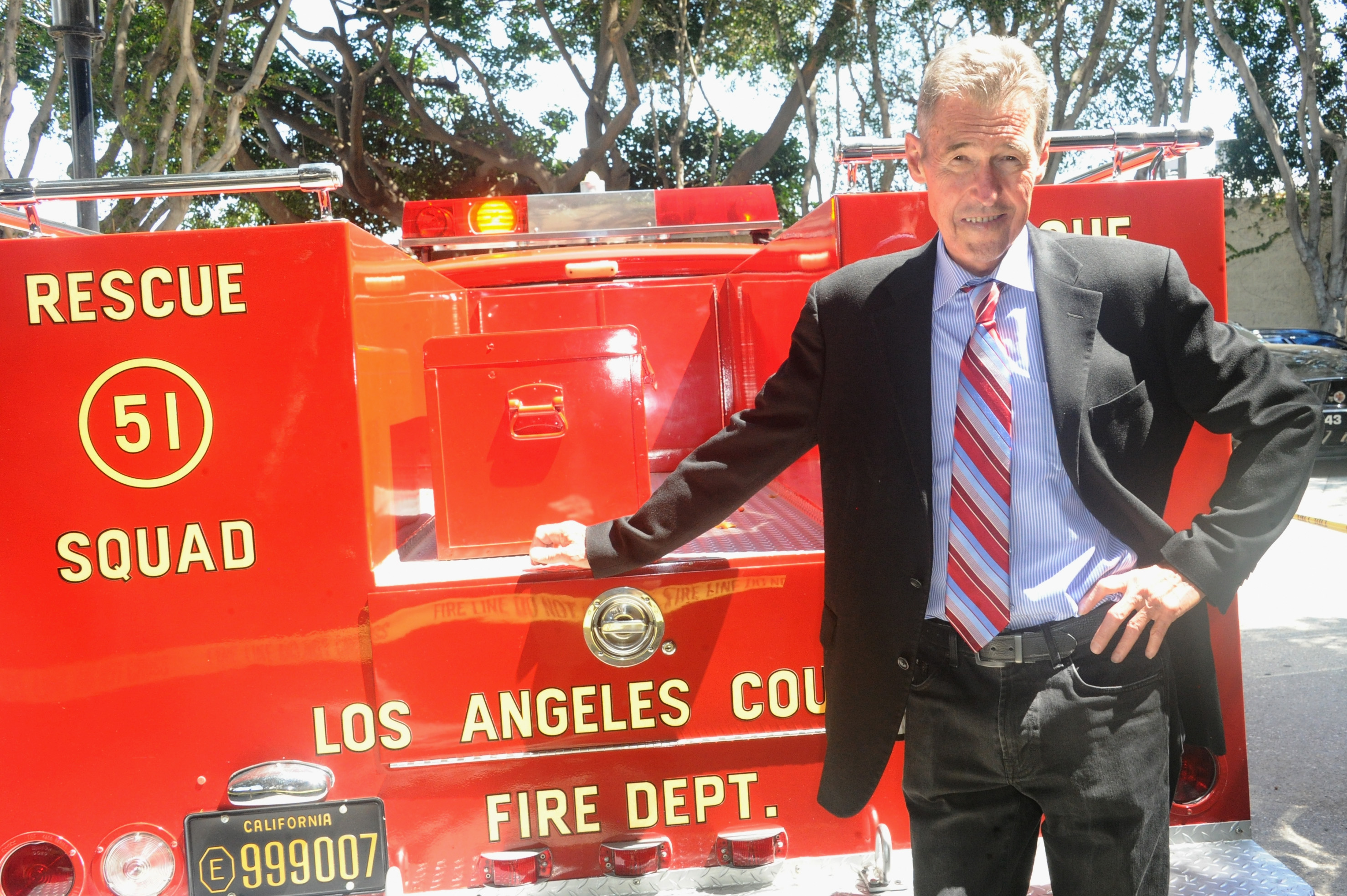 Randolph Mantooth with his vehicle from 'Emergency' at The Hollywood Show in 2017 | Source: Getty Images