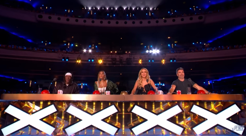 Judges KSI, Alesha Dixon, Amanda Holden, and Simon Cowell react during a lively audition moment in a video dated 11 April 2026. | Source: YouTube/Britain's Got Talent