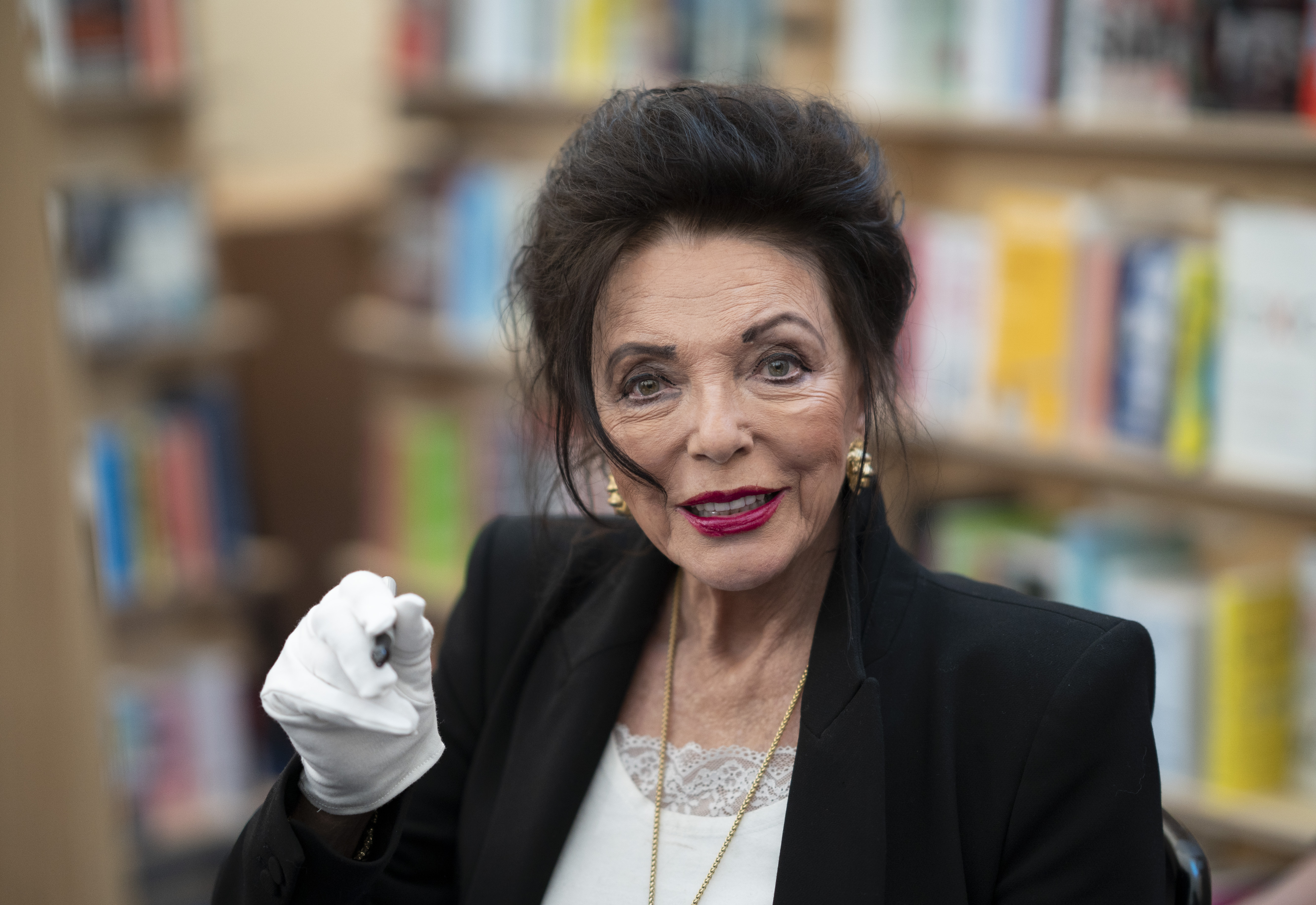 Joan Collins at the Cheltenham Literature Festival on October 16, 2021, in Cheltenham, England | Source: Getty Images