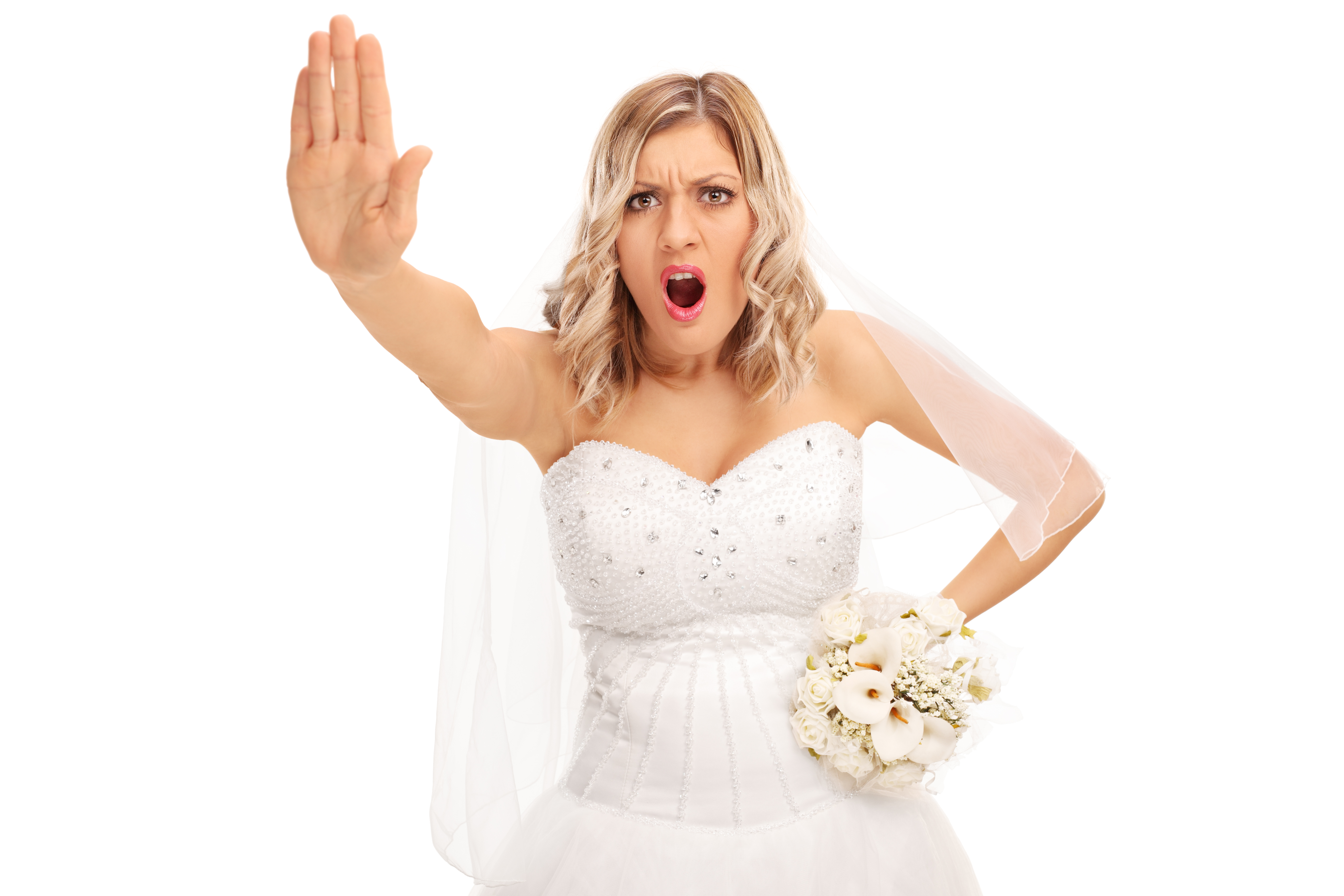 Angry bride with her hand up indicating "stop" | Source: Shutterstock