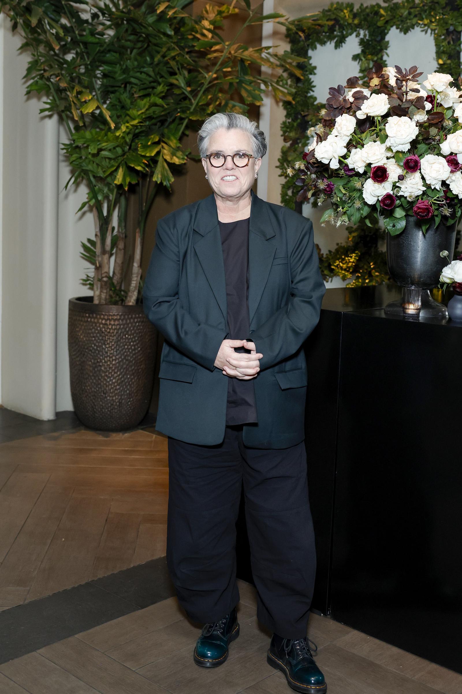 At ELLE’s Women in Hollywood celebration on November 19, 2024, Rosie O'Donnell appeared polished in a dark green blazer and relaxed trousers. With cropped silver hair and a warm smile, she projected quiet sophistication in Beverly Hills.