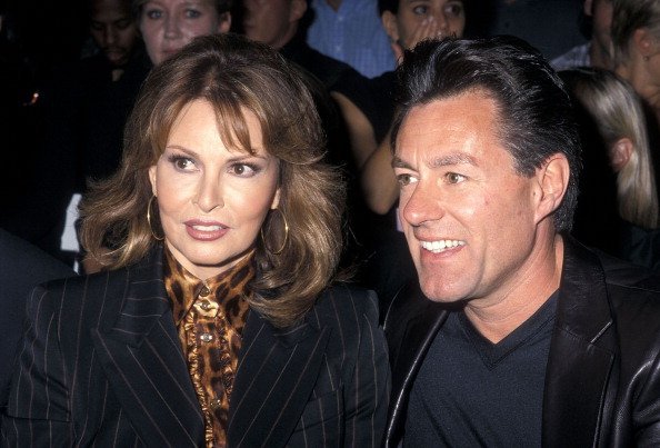  Raquel Welch and husband Richard Palmer at the Spring Fashion Week: Escada Fashion Show on September 12, 2000 | Photo: Getty Images
