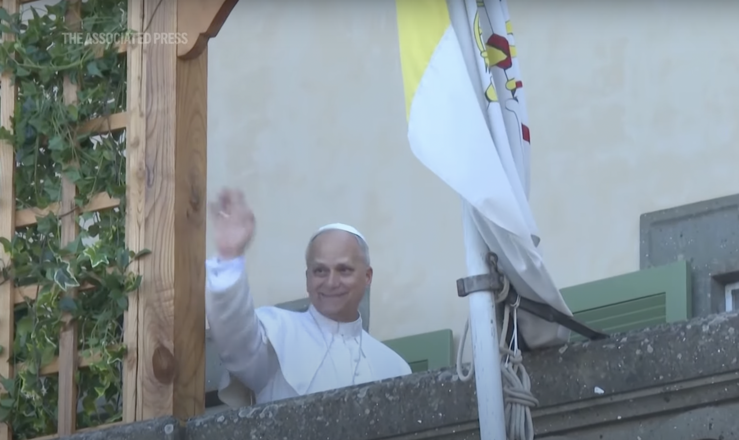 Pope Leo XIV waves to the citizens outside Villa Barberini in Castel Gandolfo, dated July 2025 | Source: YouTube/APArchive