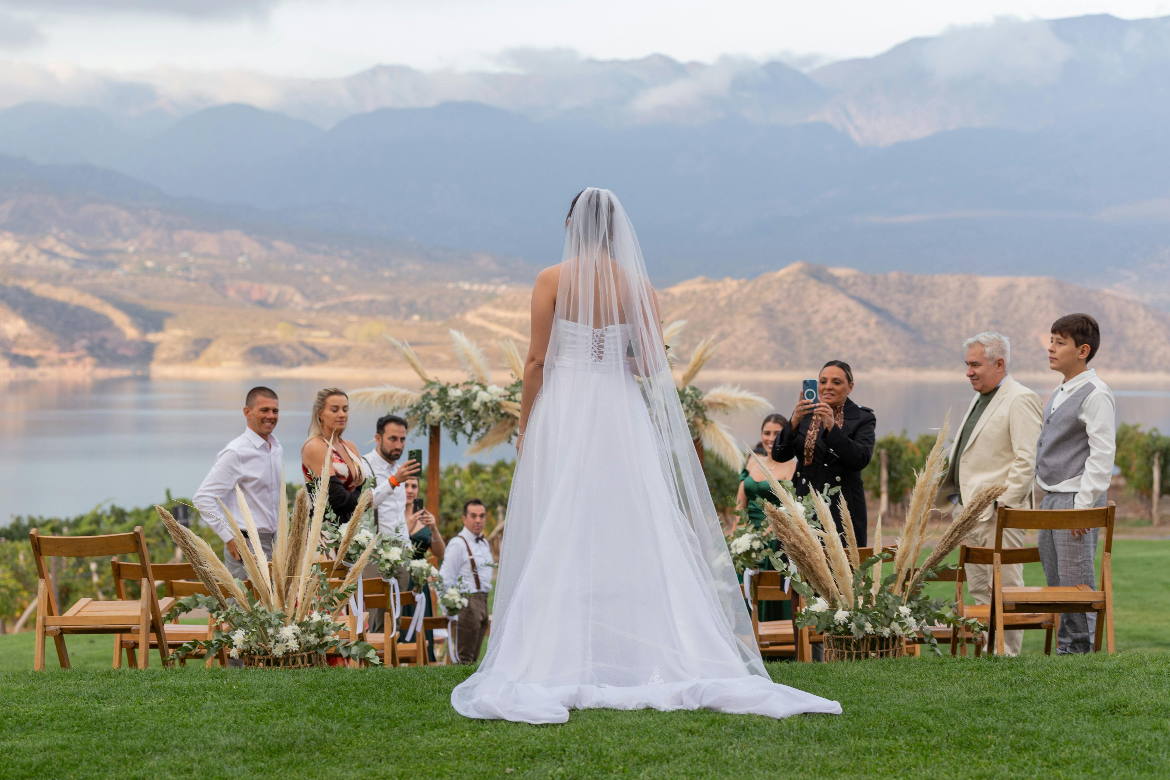 A back view of the bride in during her wedding | Source: Pexels