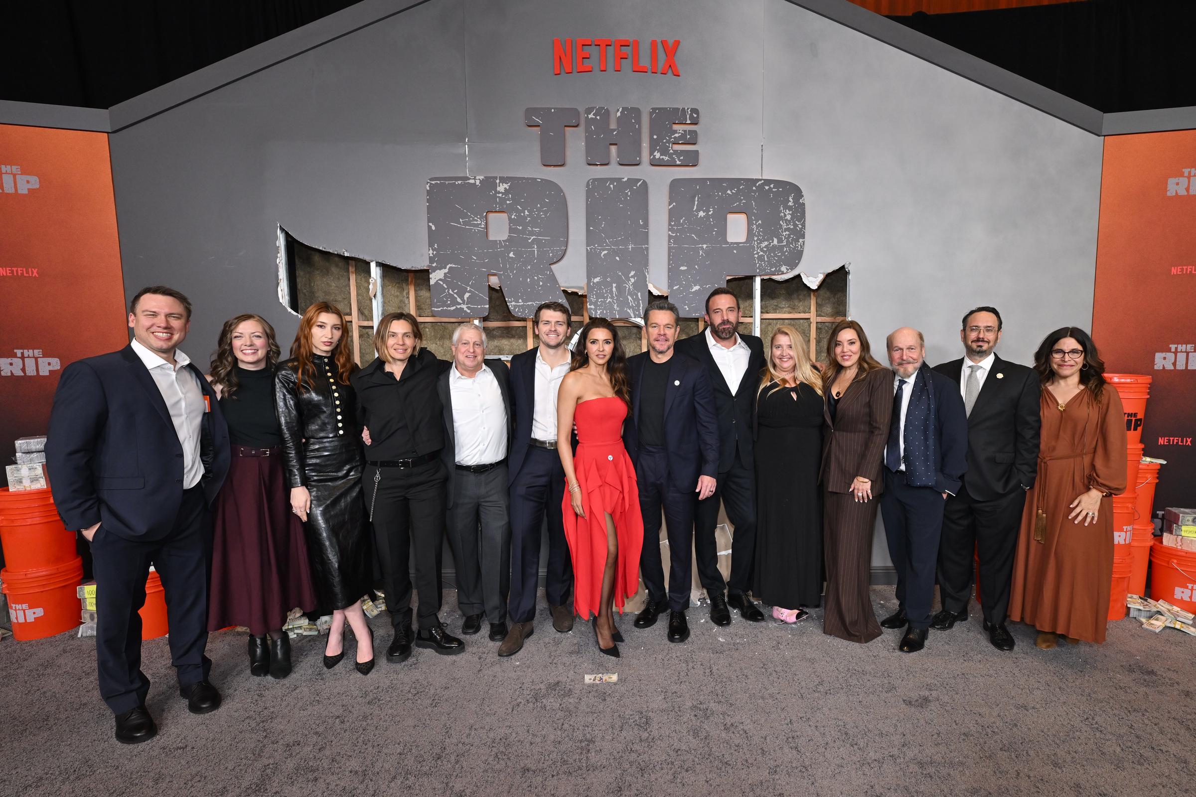 The cast and crew of "The Rip' pose for a group photo at the film's New York premiere on January 13, 2026 | Source: Getty Images