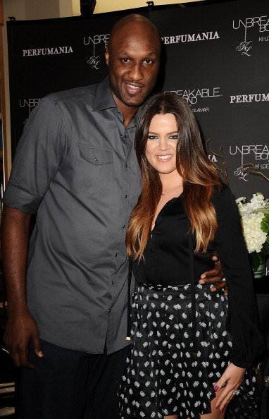 Lamar Odom and Khloe Kardashian at Perfumania on June 7, 2012 | Photo: Getty Images