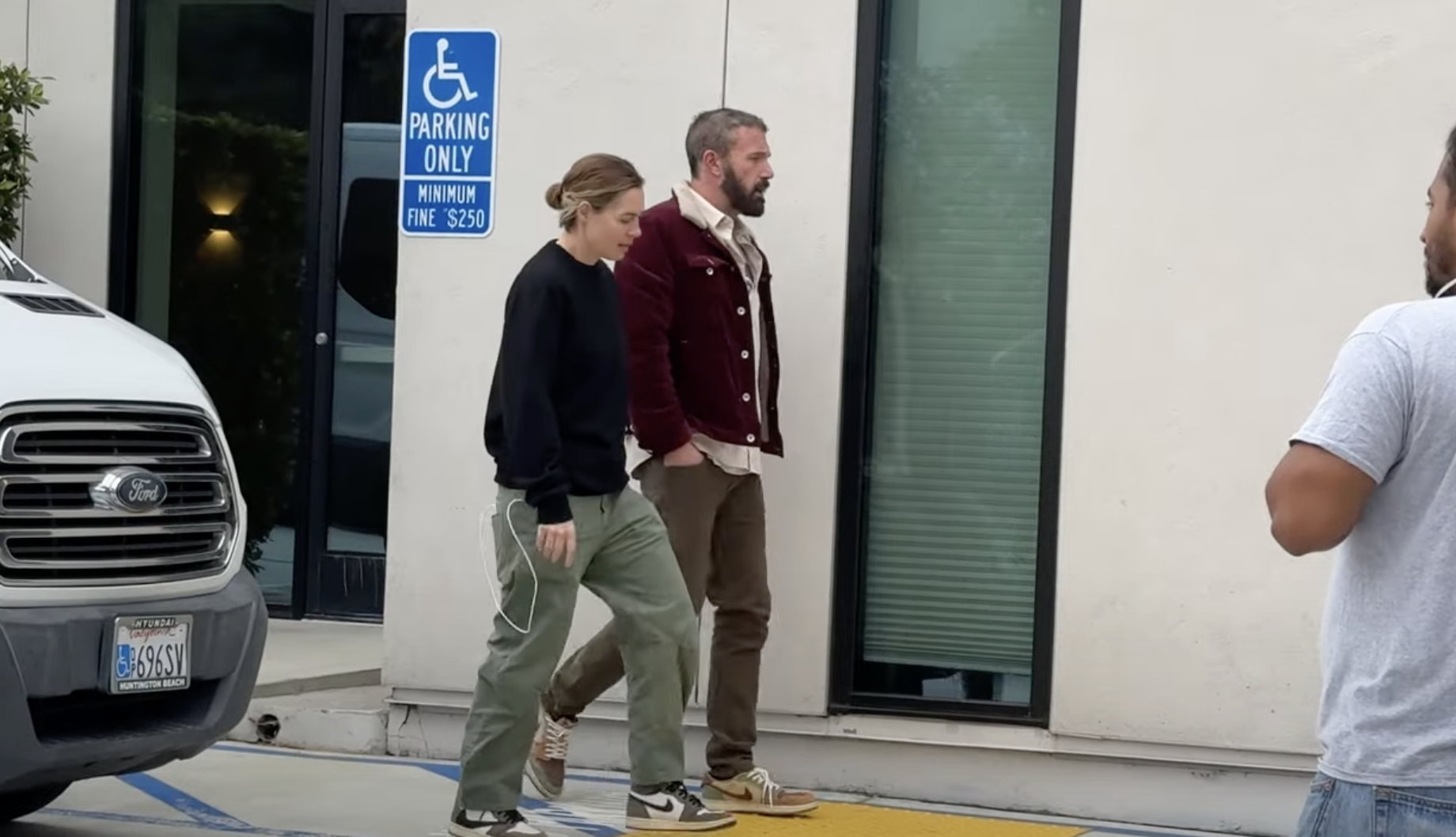 Ben Affleck, with an iced coffee in hand, and Gigi Fouquet arrive for work , from a post dated October 15, 2024 | Source: Youtube/@x17online