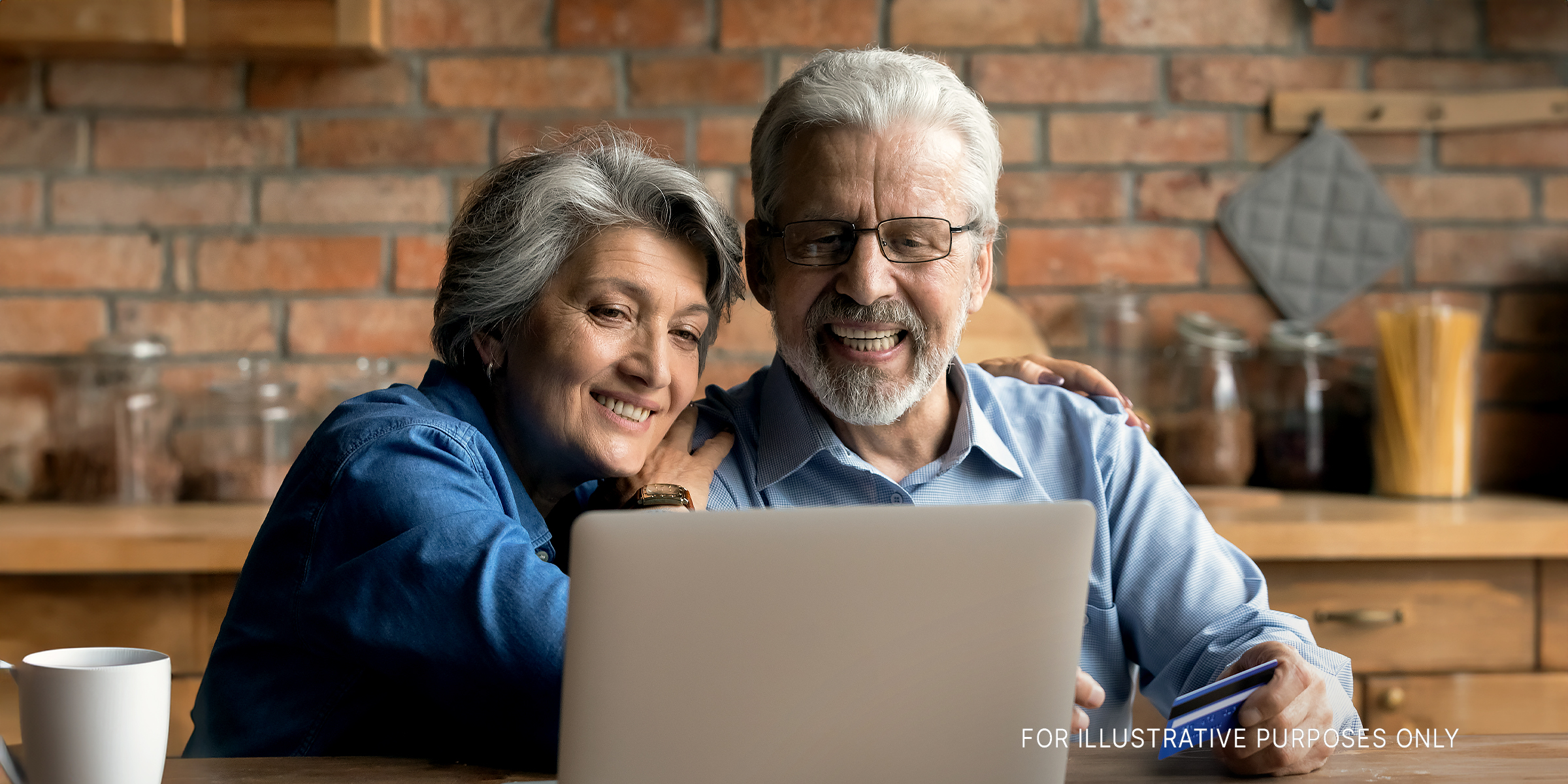Senior couple using a laptop | Source: Shutterstock