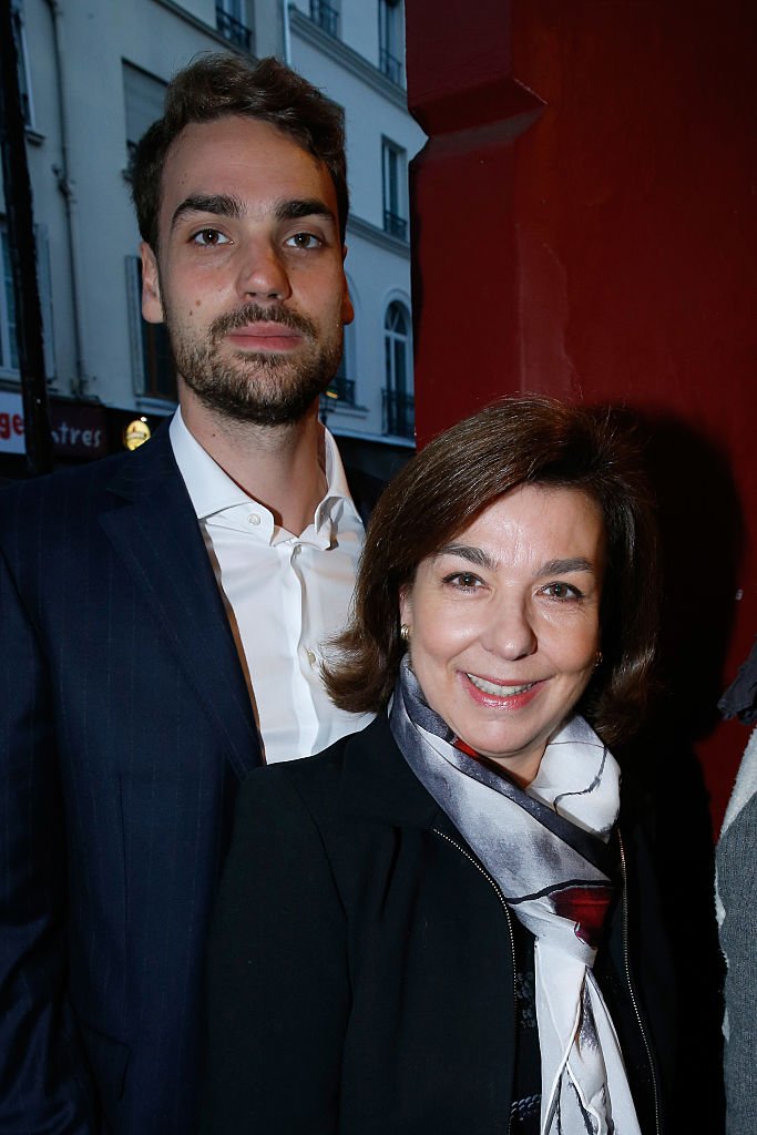 Fils d'Yves Montand, Valentin Livi et sa mère Carole Amiel assistent à l'événement "Ivo Livi ou le destin d'Yves Montand" le 11 Octobre 2016. | Photo : Getty Images