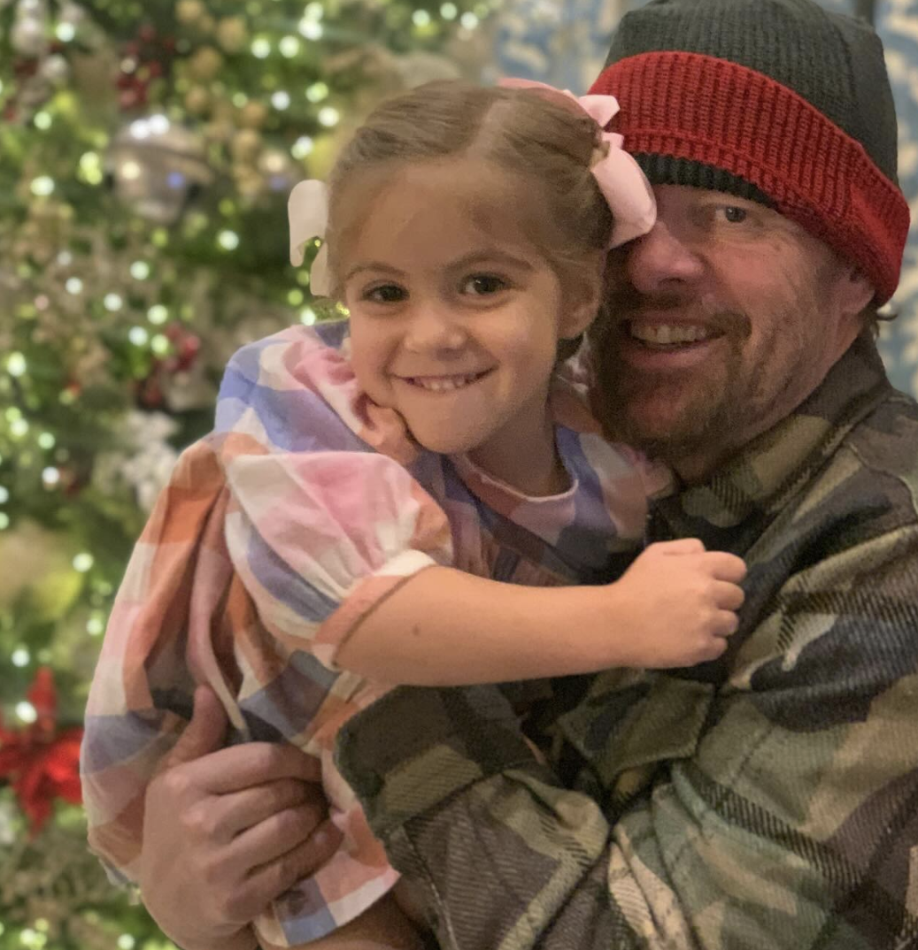Toby Keith and his granddaughter in an Instagram carousel dated February 10, 2024 | Source: Instagram.com/krystalkeith/